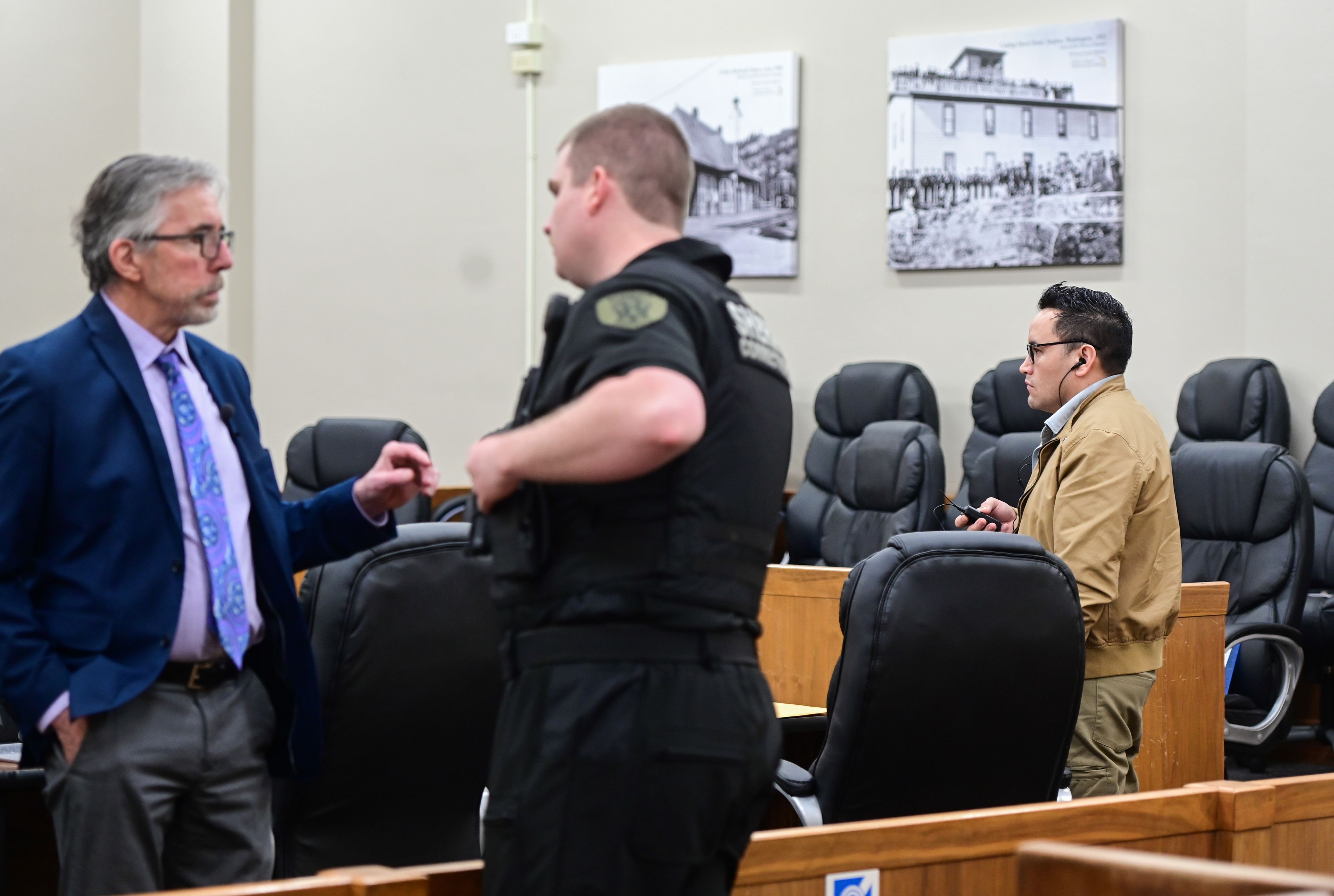 Juan Trejo Perez, right, listens to a translation of the third witness questioning in Trejo Perez’s Whitman County Superior Court jury trail in Colfax on Tuesday while the court takes a break. A jury will choose whether to convict the 34-year-old Trejo Perez of felony third-degree child molestation.