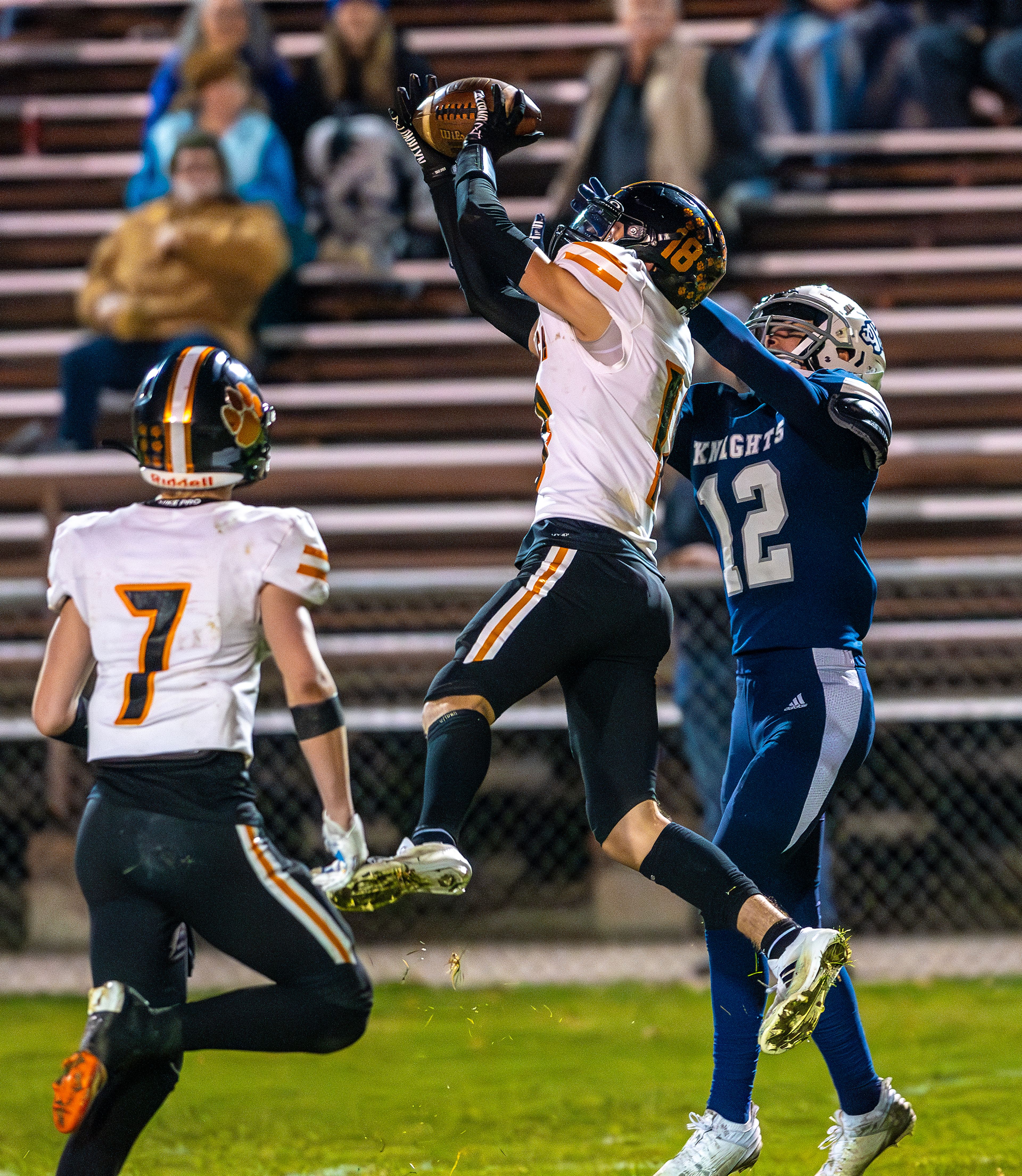 Kendrick defensive back Cade Silflow intercepts a pass intended for Logos wide receiver Ryan Daniels in a semifinal game of the Idaho State Football Class 2A Championships Friday at Bengal Field in Lewiston.