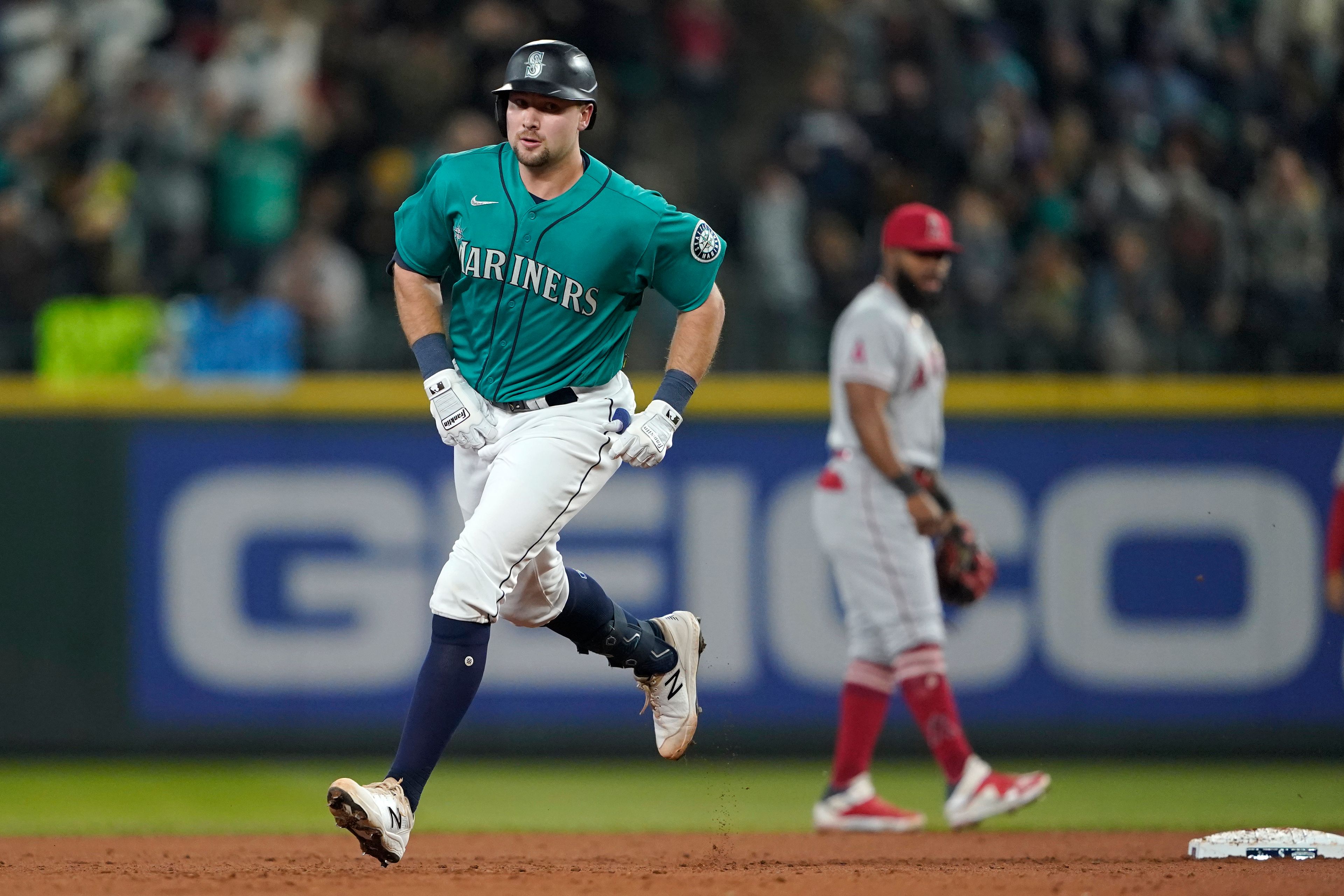 Seattle Mariners' Cal Raleigh rounds the bases after he hit a solo home run against the Los Angeles Angels during the second inning of a baseball game, Friday, June 17, 2022, in Seattle. (AP Photo/Ted S. Warren)