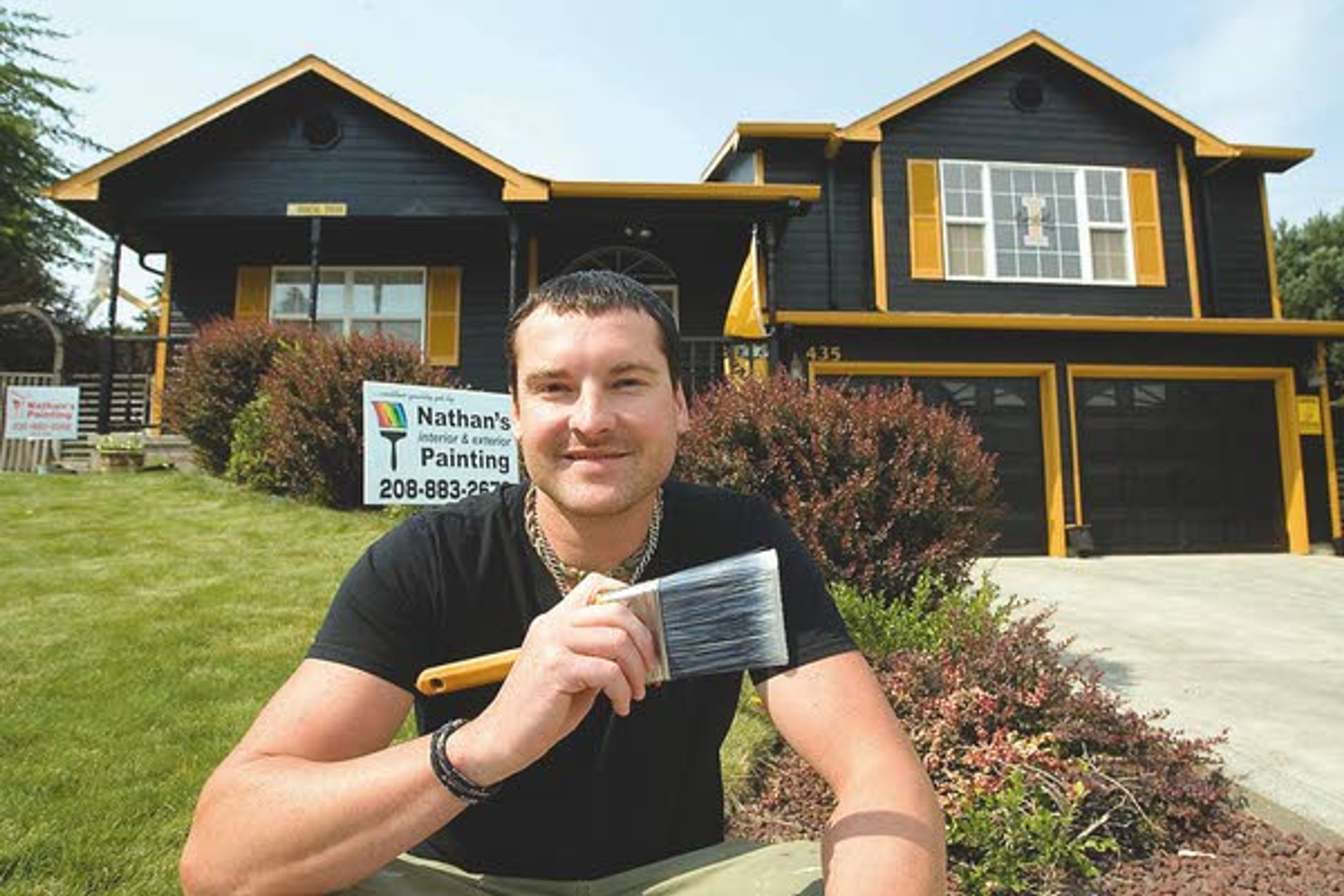 Nathan Vowels and his employees from Nathan's Painting painted his Moscow home in University of Idaho colors Aug. 10.