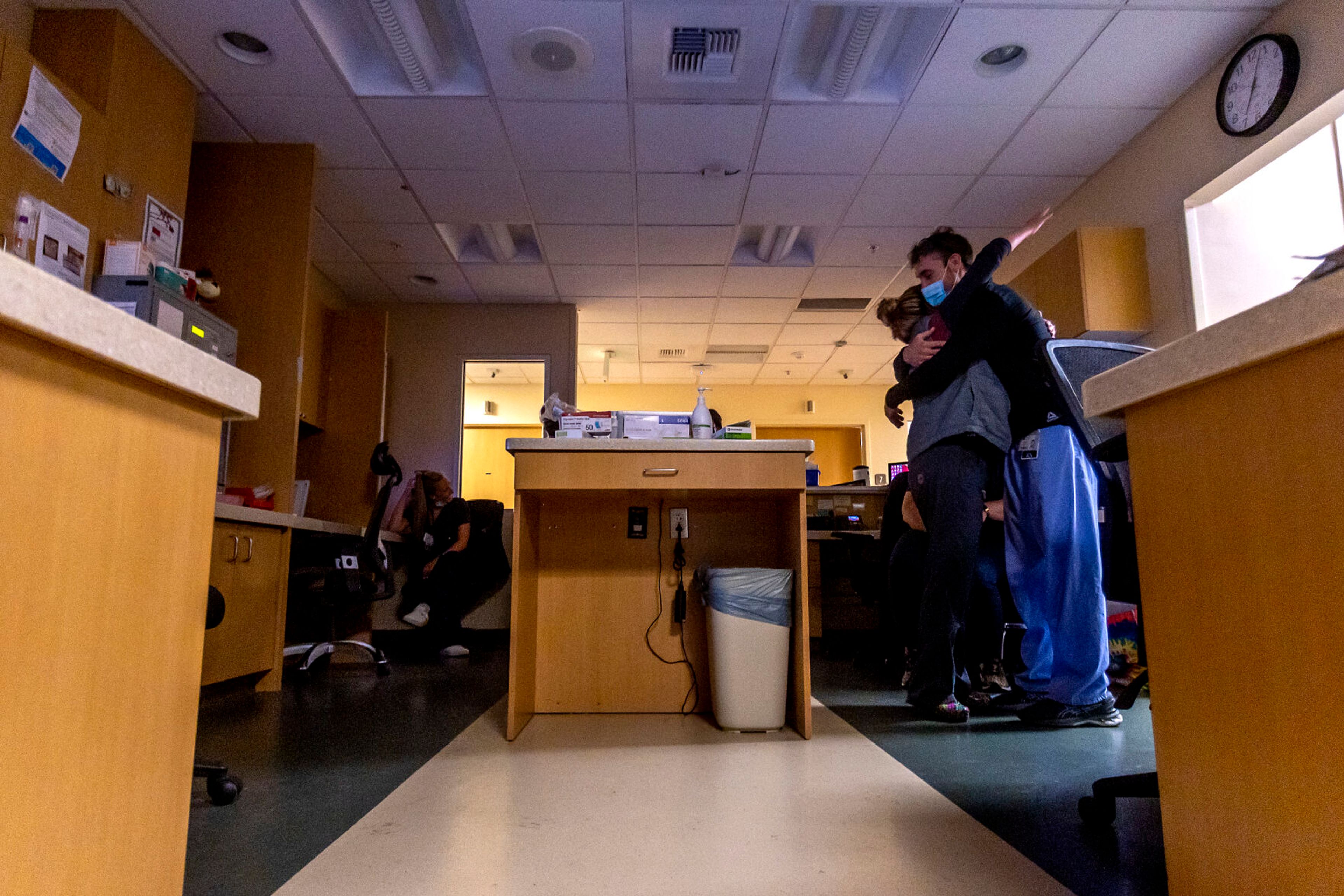 Grand Guinard hugs Carey Howe at the Pullman Regional Hospital emergency room Sept. 24.