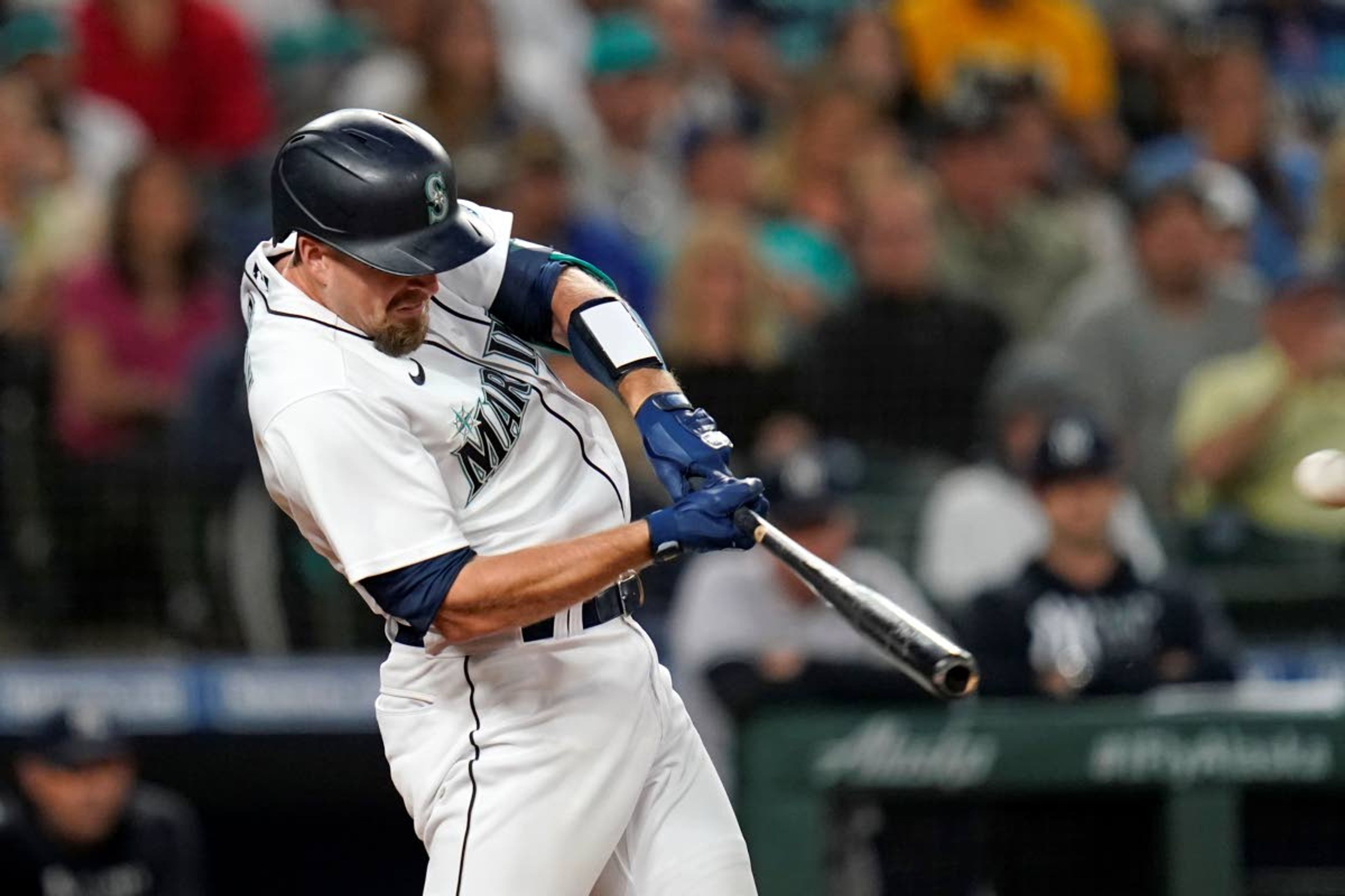 Seattle Mariners' Tom Murphy connects on a three-run home run against the New York Yankees during the sixth inning of a baseball game Wednesday, July 7, 2021, in Seattle. (AP Photo/Elaine Thompson)