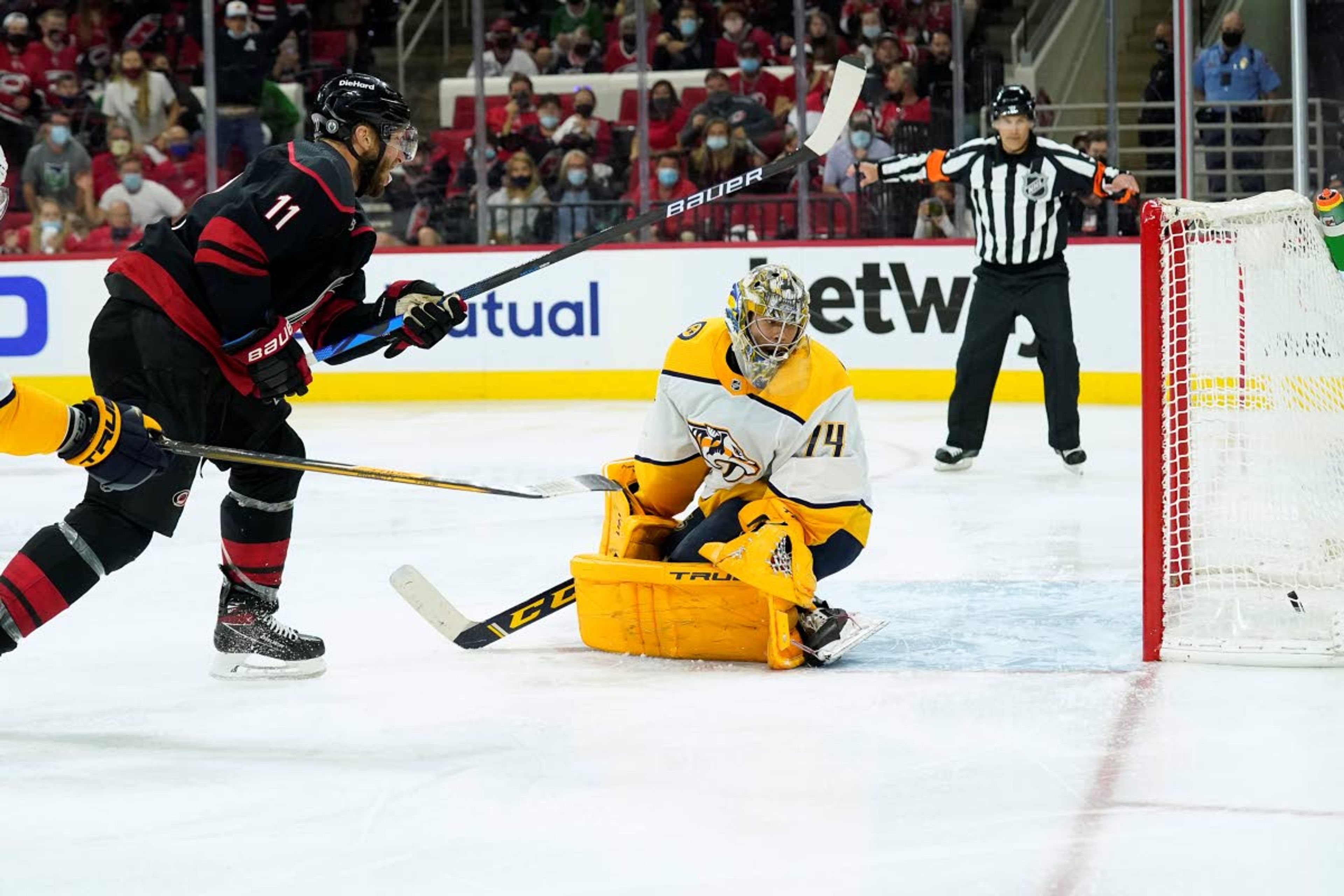 Associated PressHurricanes center Jordan Staal scores against Predators goaltender Juuse Saros during overtime in Game 5 of an NHL Stanley Cup first-round playoff series Tuesday in Raleigh, N.C.