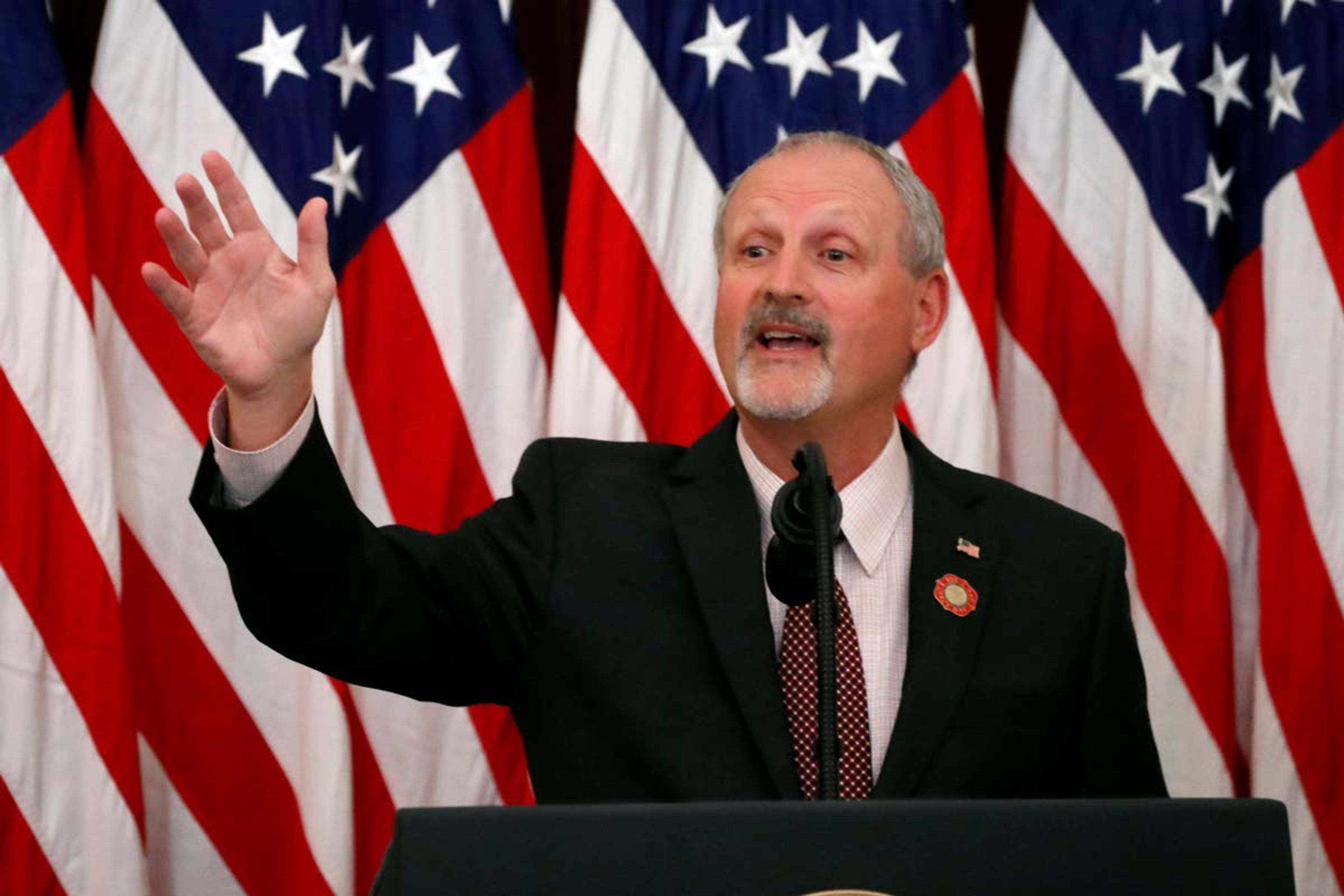 FILE - In this May 1, 2020, file photo, Frank Siller, founder and president of Tunnel to Towers, speaks during an event to honor volunteers helping to battle the coronavirus, in the Blue Room of the White House in Washington. The coronavirus pandemic has reshaped how the U.S. is observing the anniversary of 9/11. Stiller's Tunnel to Towers Foundation arranged its own simultaneous ceremony a few blocks the main one at the National September 11 Memorial & Museum, saying victims' relatives could recite names while keeping a safe distance. (AP Photo/Alex Brandon, File)