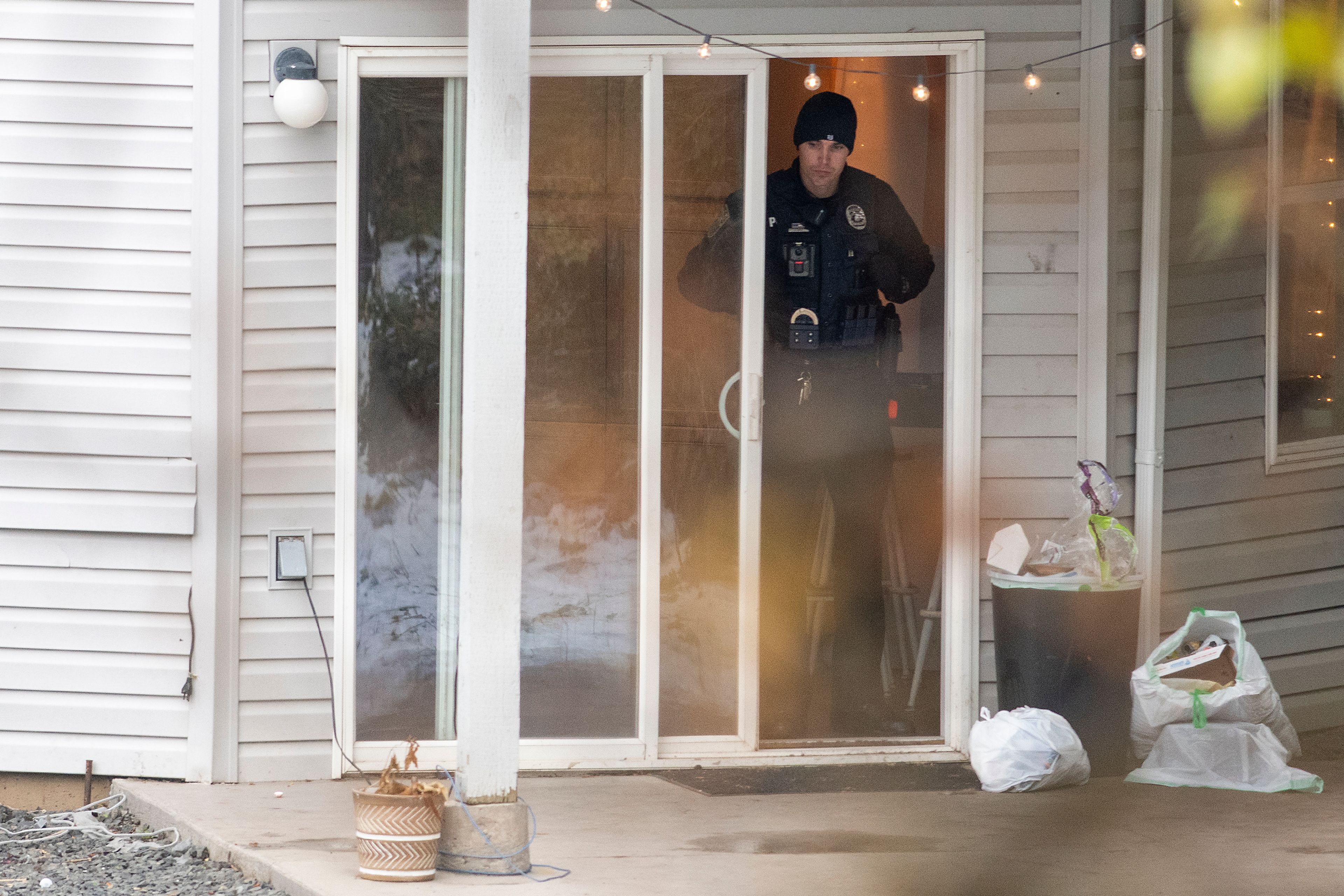 Officers investigate a homicide at an apartment complex south of the University of Idaho campus.