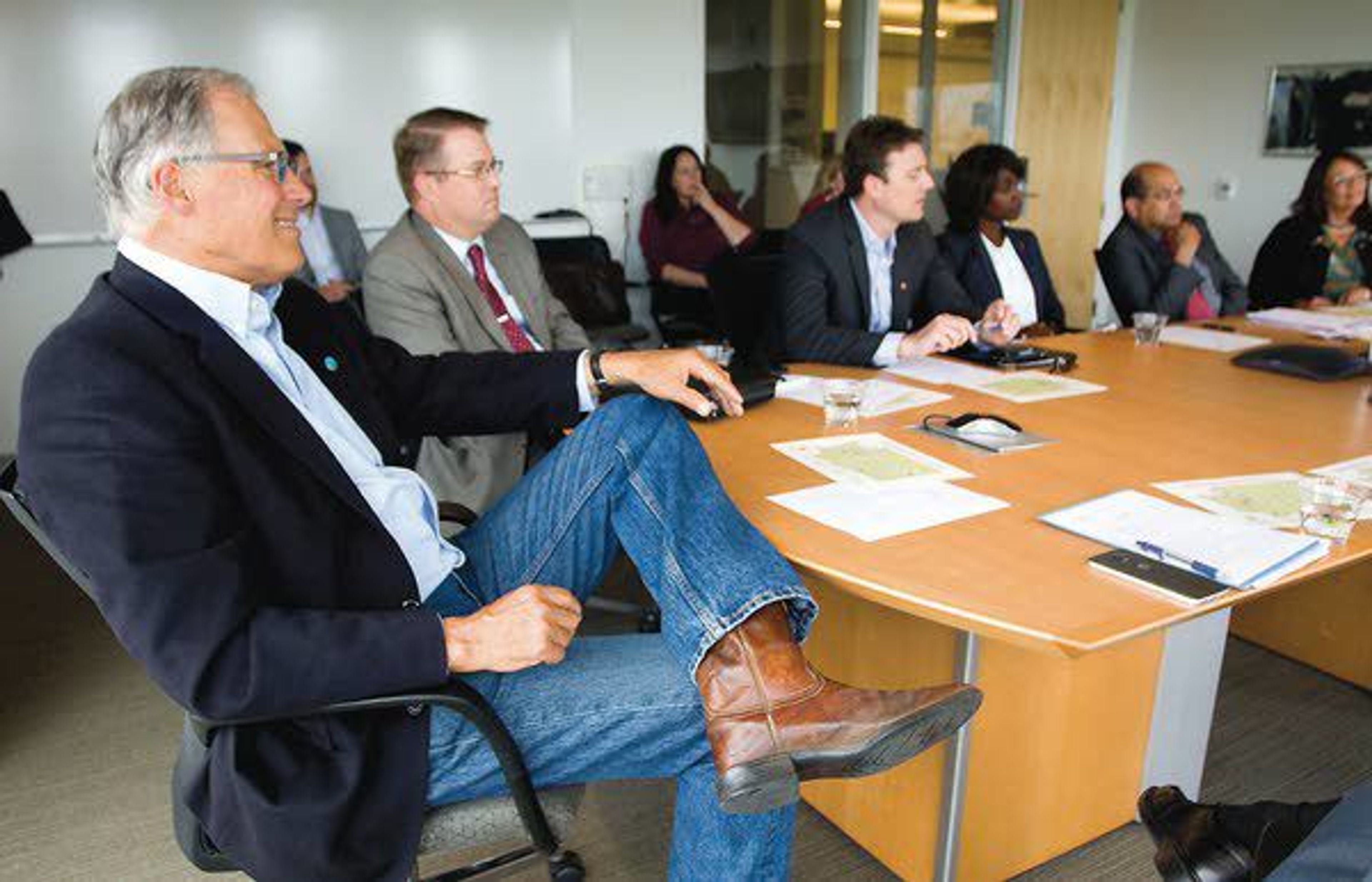 Washington Gov. Jay Inslee, left, speaks at meeting at Washington State University as part of his statewide broadband access tour on Wednesday in Pullman.