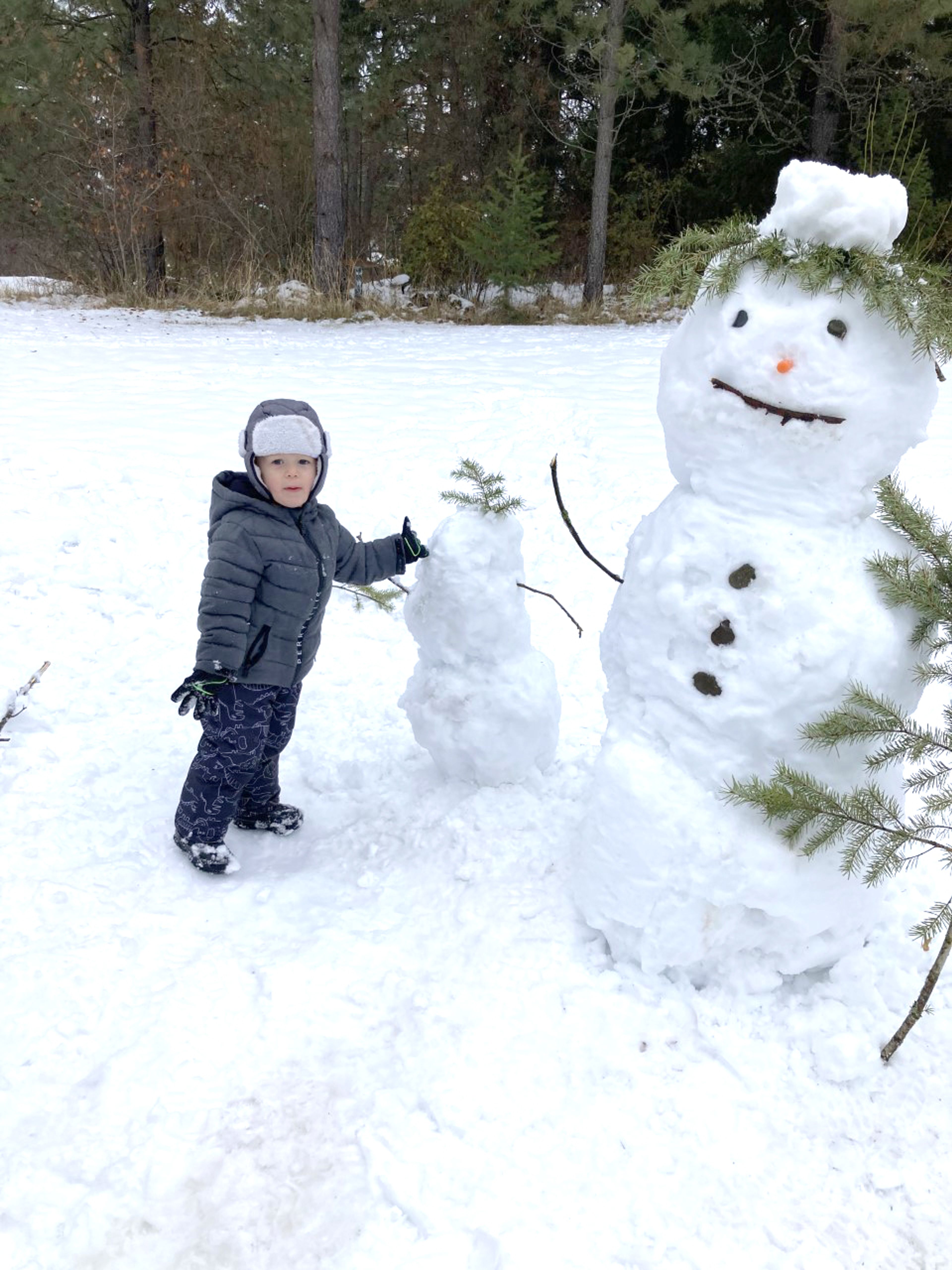 Jami Brown of Juliaetta, and her grandson, Kaysen, left, spent a recent morning making snowmen.