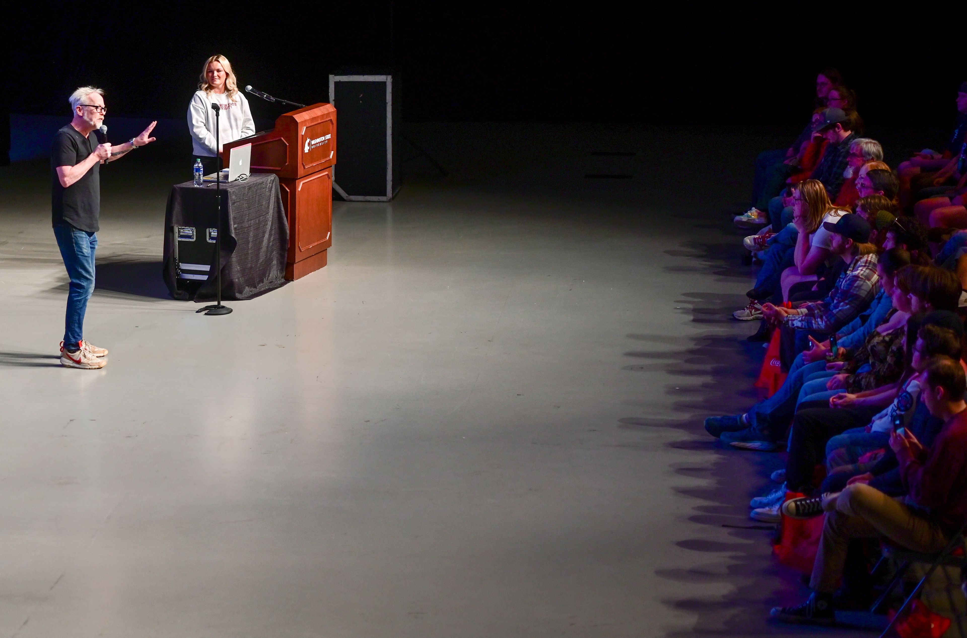 Adam Savage speaks at an Earth Day event hosted at Beasley Coliseum in Pullman on Sunday. The former co-host of "MythBusters" gave a keynote on his work and responded to crowd questions.