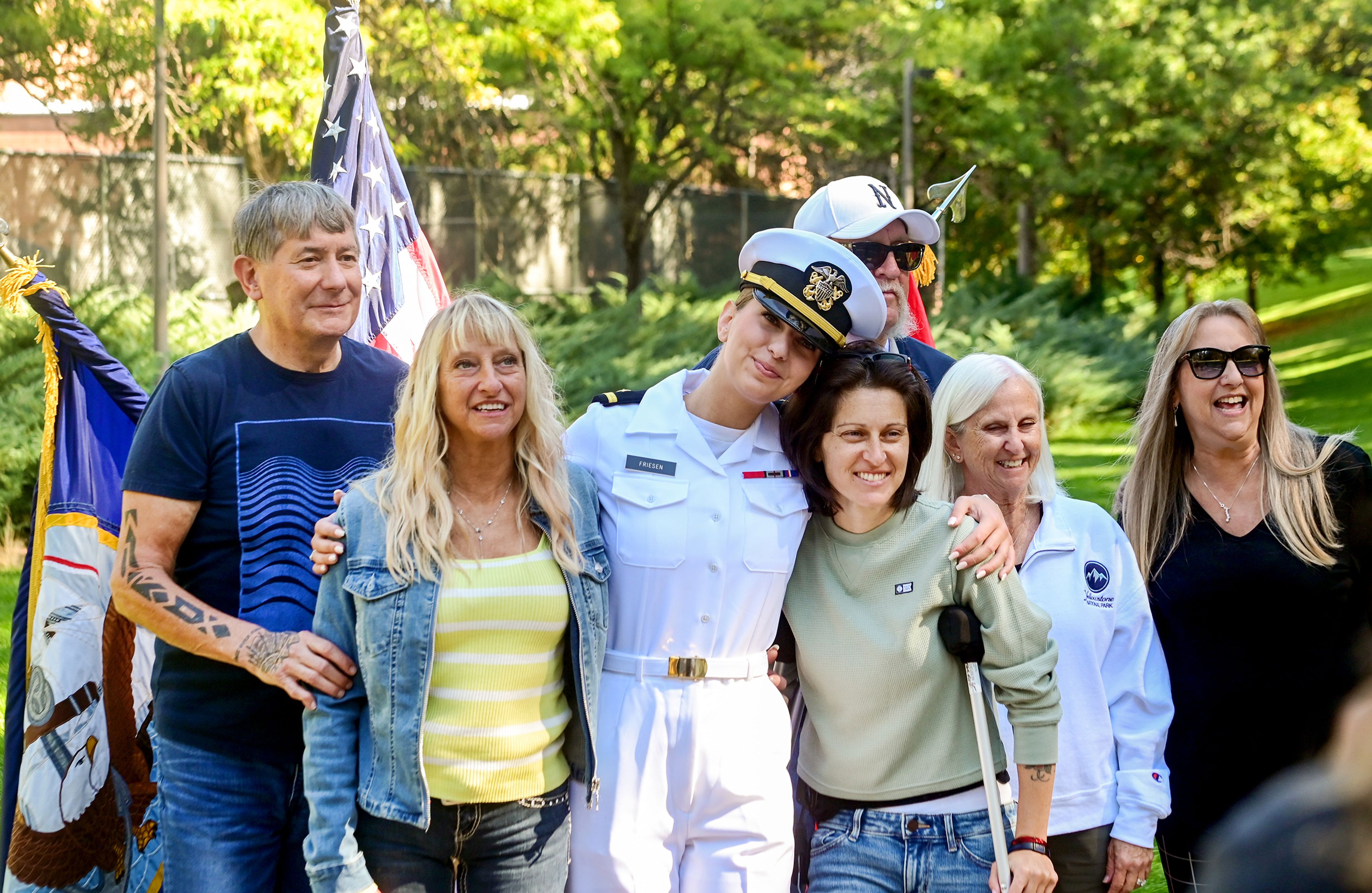 Loved ones gather around Alex Friesen, center, for a group photo following Friesens commissioning ceremony Friday in Moscow.,