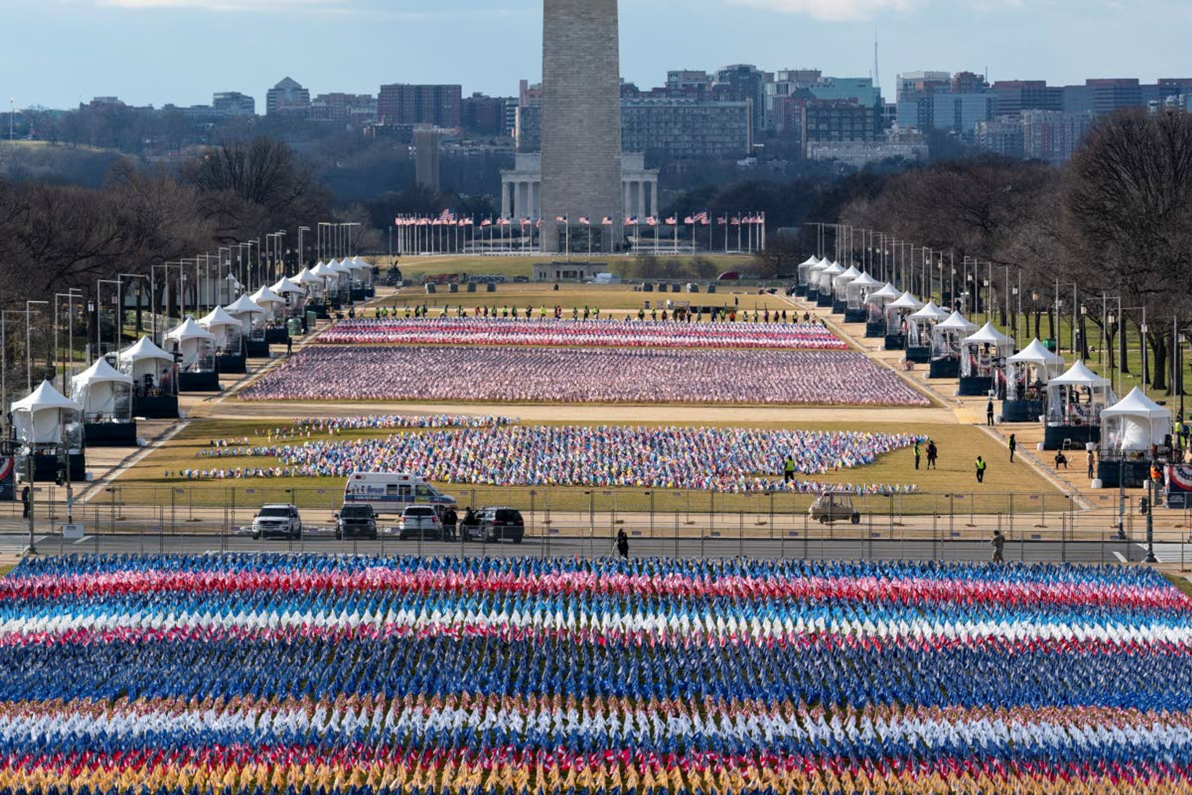 Flags are placed on the National Mall, looking toward the Washington Monument and the Lincoln Memorial on Monday ahead of the inauguration of President-elect Joe Biden and Vice President-elect Kamala Harris in Washington, D.C. Associated Press