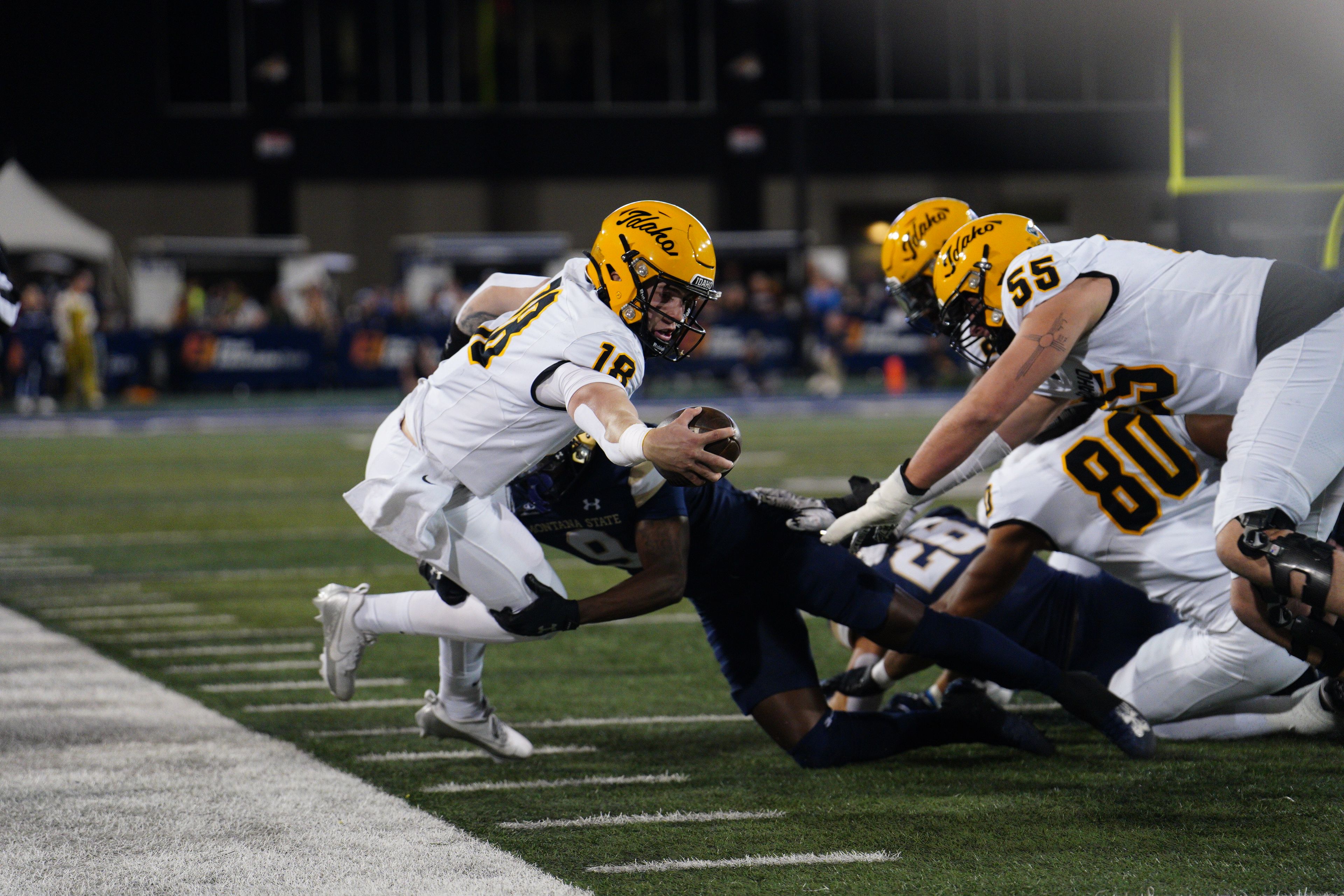 Idaho quarterback Nick Josifek reaches for a first down during the Vandals� game versus the Montana State Bobcats on Saturday, Oct. 12, 2024, in Bozeman, Mont.