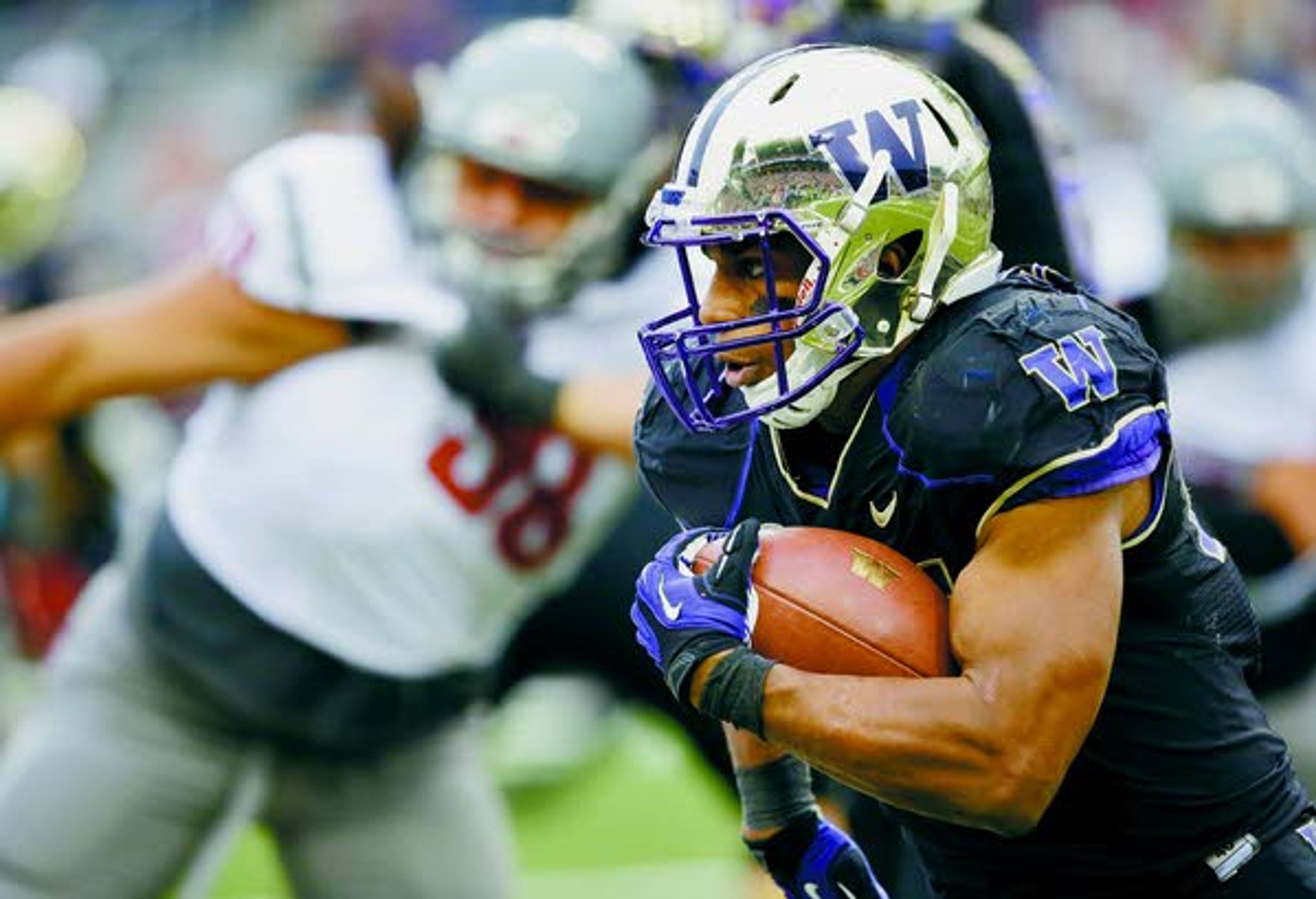 Washington’s Bishop Sankey rushed for 200 yards Friday, including 139 in the second half.