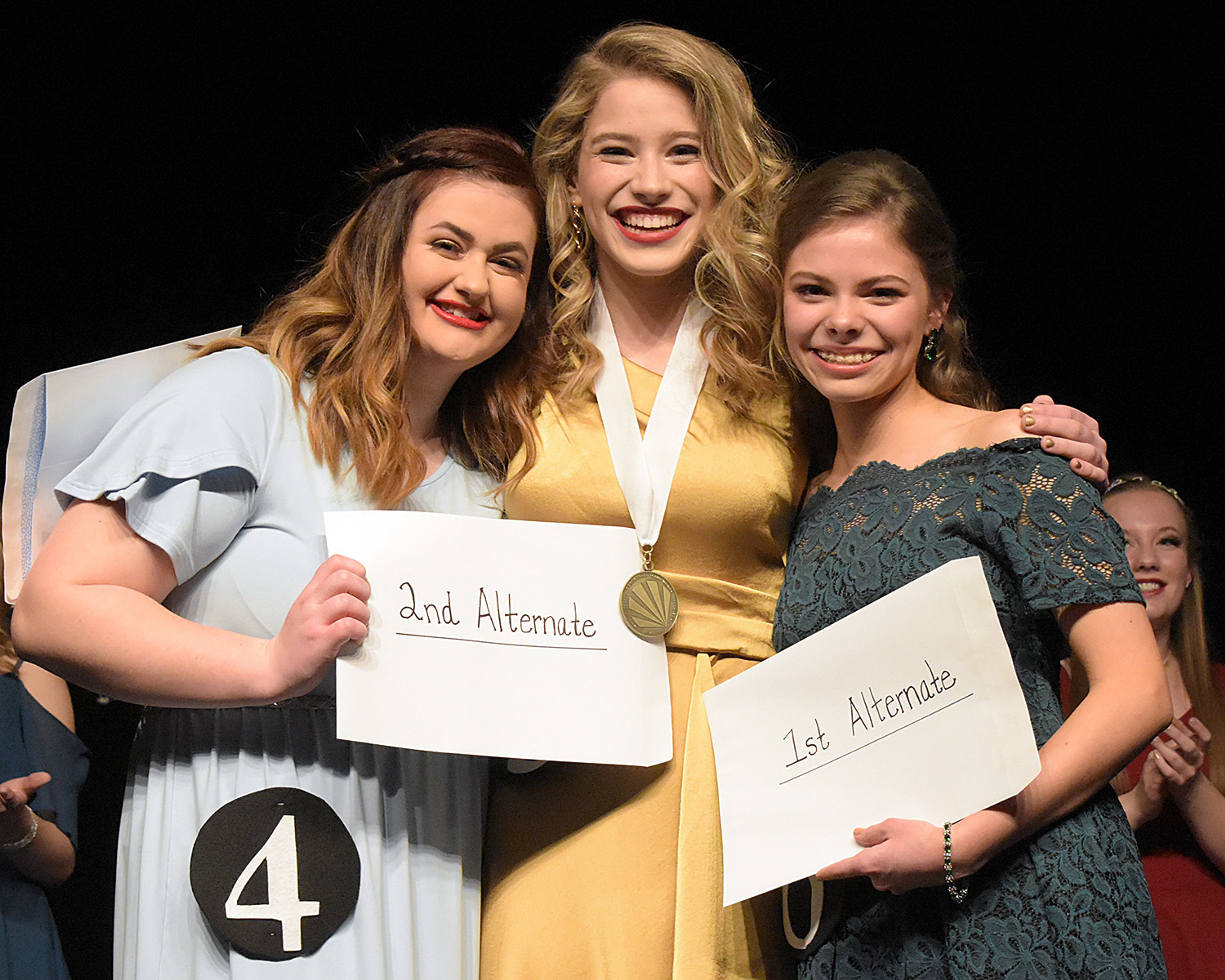 Hope Belschner, center, was named Moscow's Distinguished Young Woman Saturday. Isabelle Landis, right, was named first alternate. Jessica Smith, left, was second alternate.