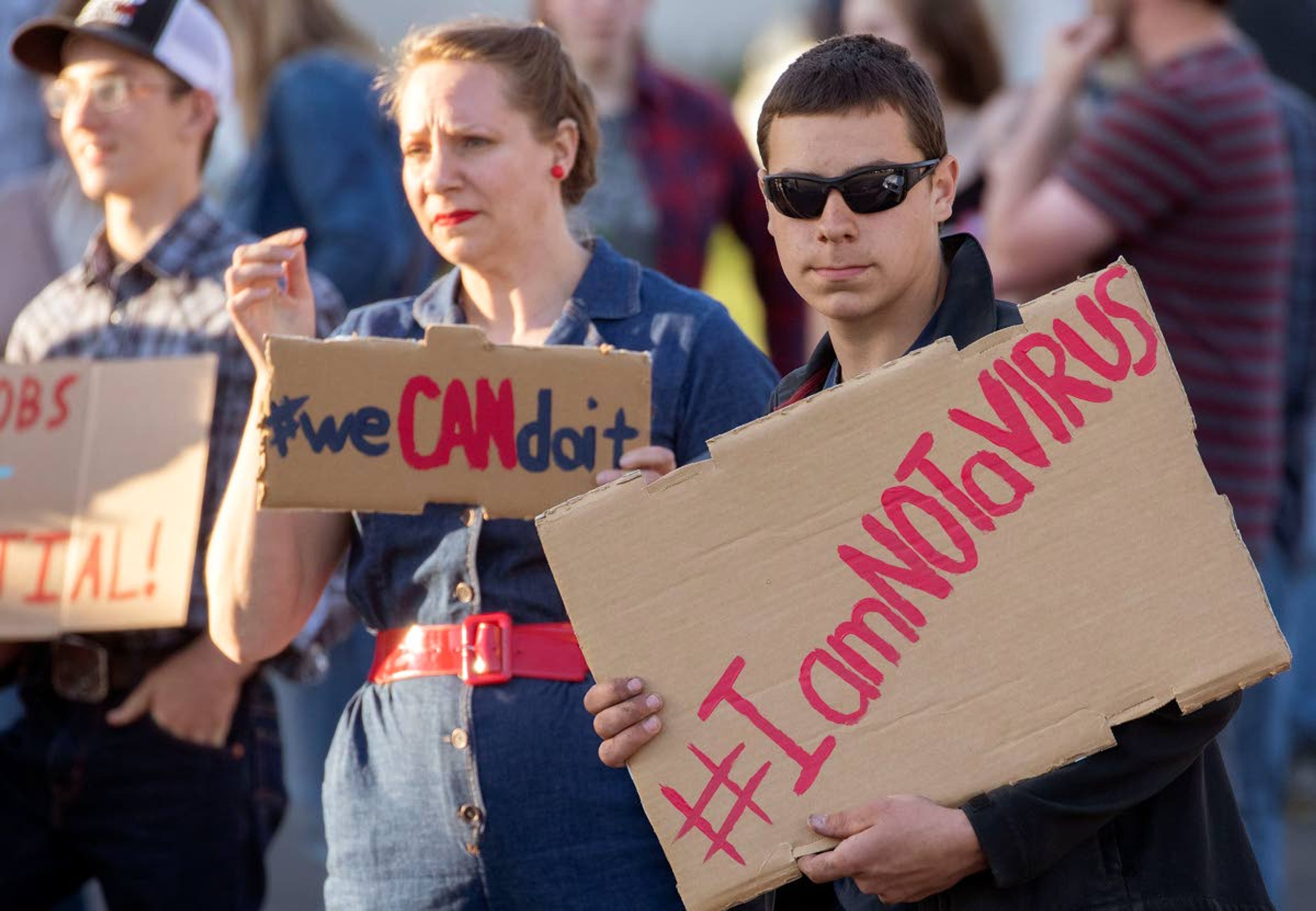 Protesters participate in the Liberate Moscow Peaceful Protest on Monday outside Moscow City Hall. The protesters were urging city leaders to reverse an order that closed businesses and asked people to stay at home to help prevent the spread of the new coronavirus.