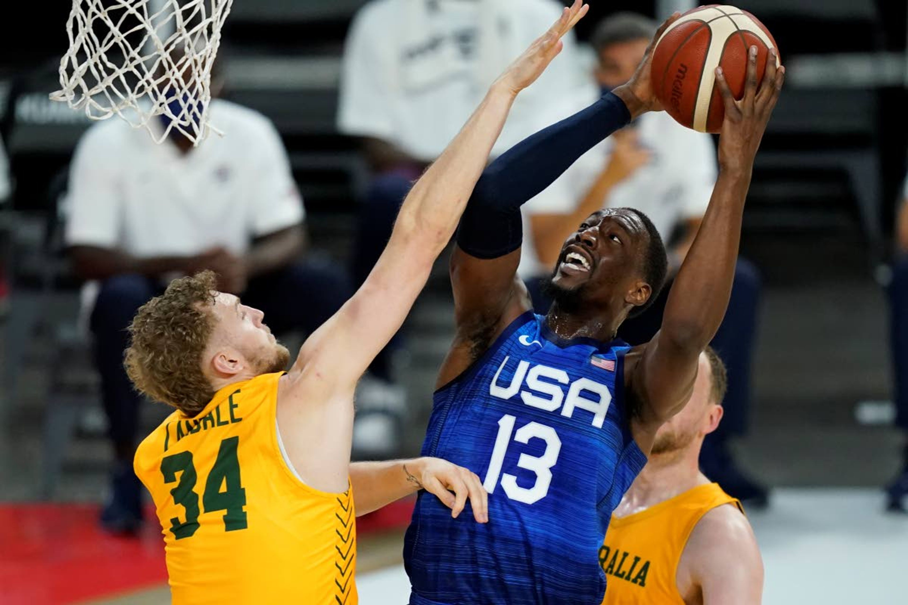 United States' Bam Adebayo attempts a shot over Australia's Jock Landale during an exhibition basketball game Monday, July 12, 2021, in Las Vegas. (AP Photo/John Locher)