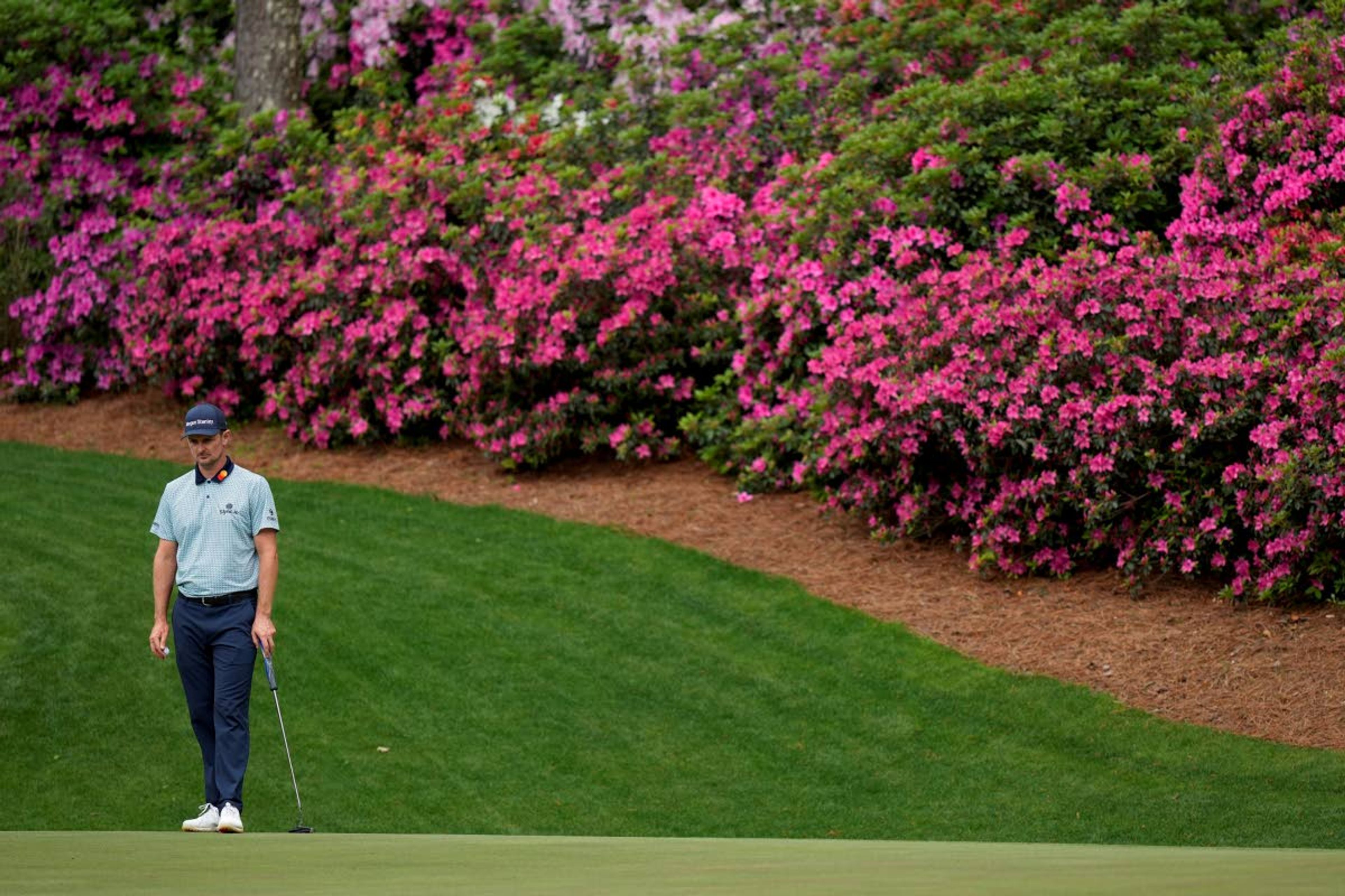 Justin Rose, of England, waits to putt on the 13th hole during the second round of the Masters golf tournament on Friday, April 9, 2021, in Augusta, Ga. (AP Photo/David J. Phillip)