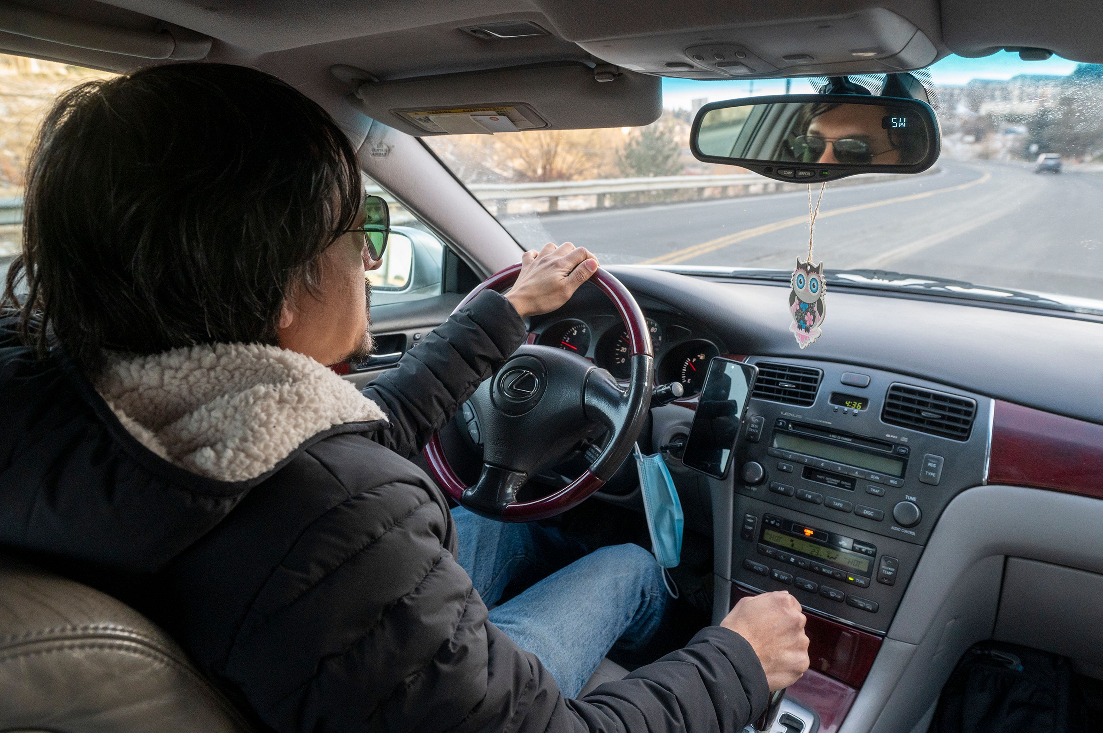 Frank Contreras, owner of Delivery Pullman, drives an older Lexus vehicle with over 250,000 miles on it while picking up food delivery orders throughout Pullman. Contreras said he has to repair the vehicle almost every three months. Contreras is seeking asylum in the U.S. and is not undocumented.