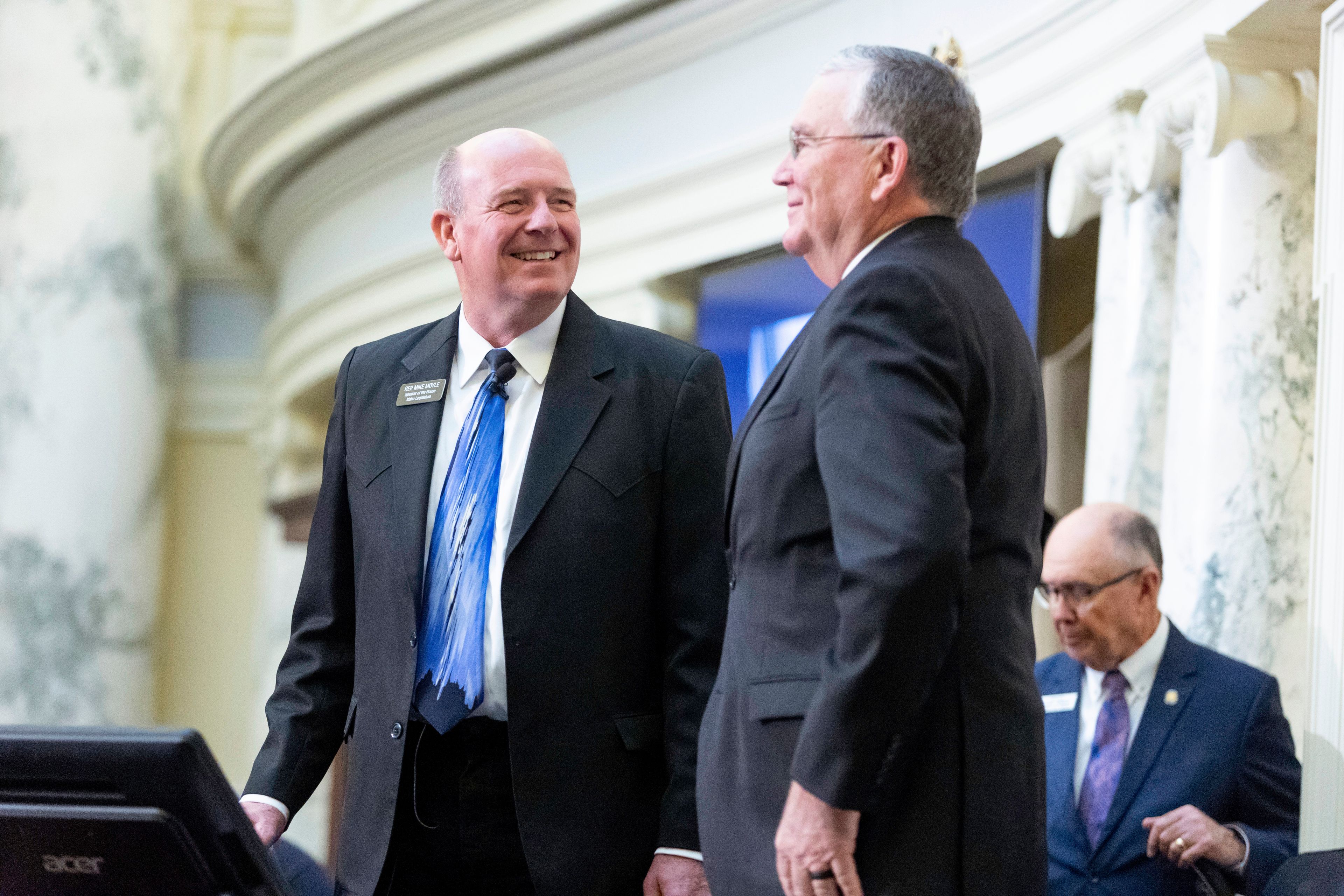 Speaker of the House Mike Moyle, left, introduces Lieutenant Governor of Idaho Scott Bedke, right, before the 2023 State of the State address held at the Idaho State Capitol, Monday, Jan. 9, 2023, in Boise, Idaho. (AP Photo/Kyle Green)