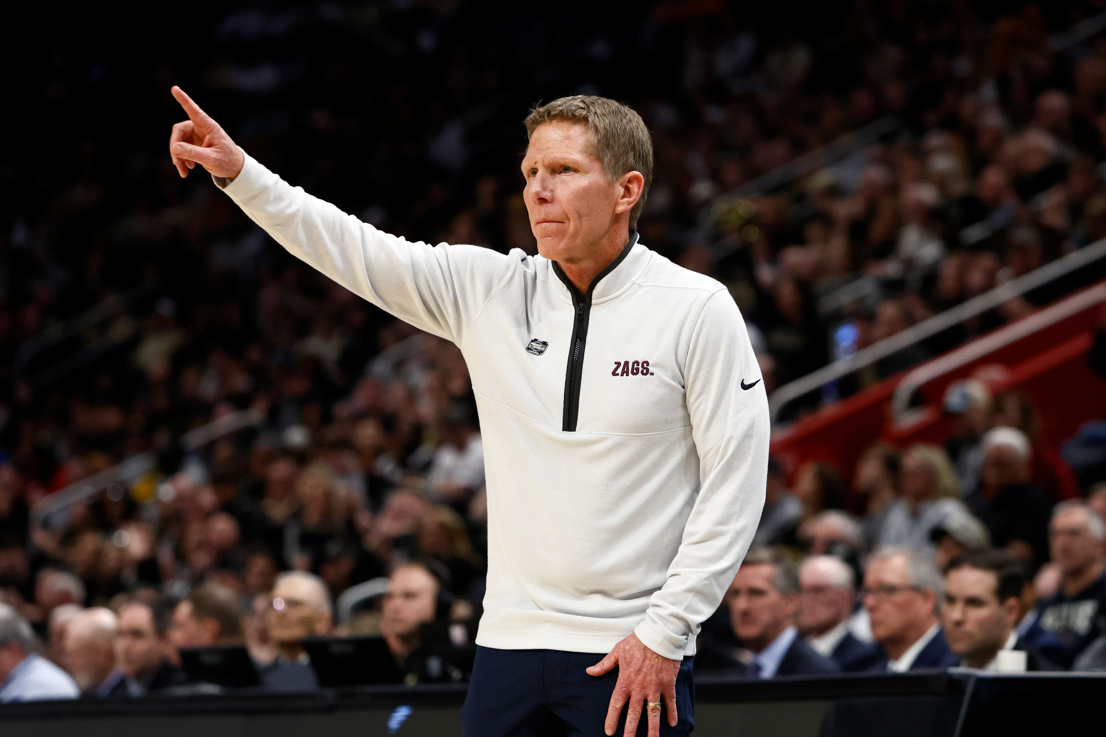 FILE - Gonzaga head coach Mark Few signals from the sideline during the first half of a Sweet 16 college basketball game against Purdue in the NCAA Tournament, March 29, 2024, in Detroit. (AP Photo/Duane Burleson, File)