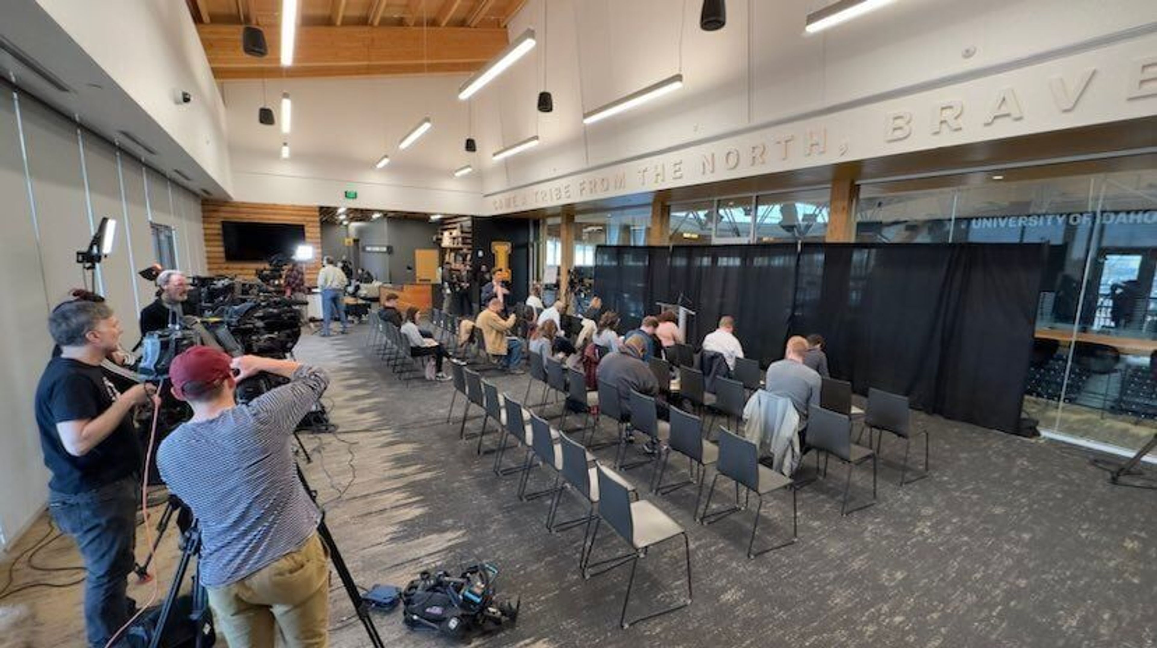 Reporters wait for the start of a news conference Wednesday afternoon at the ICCU Arena in Moscow.