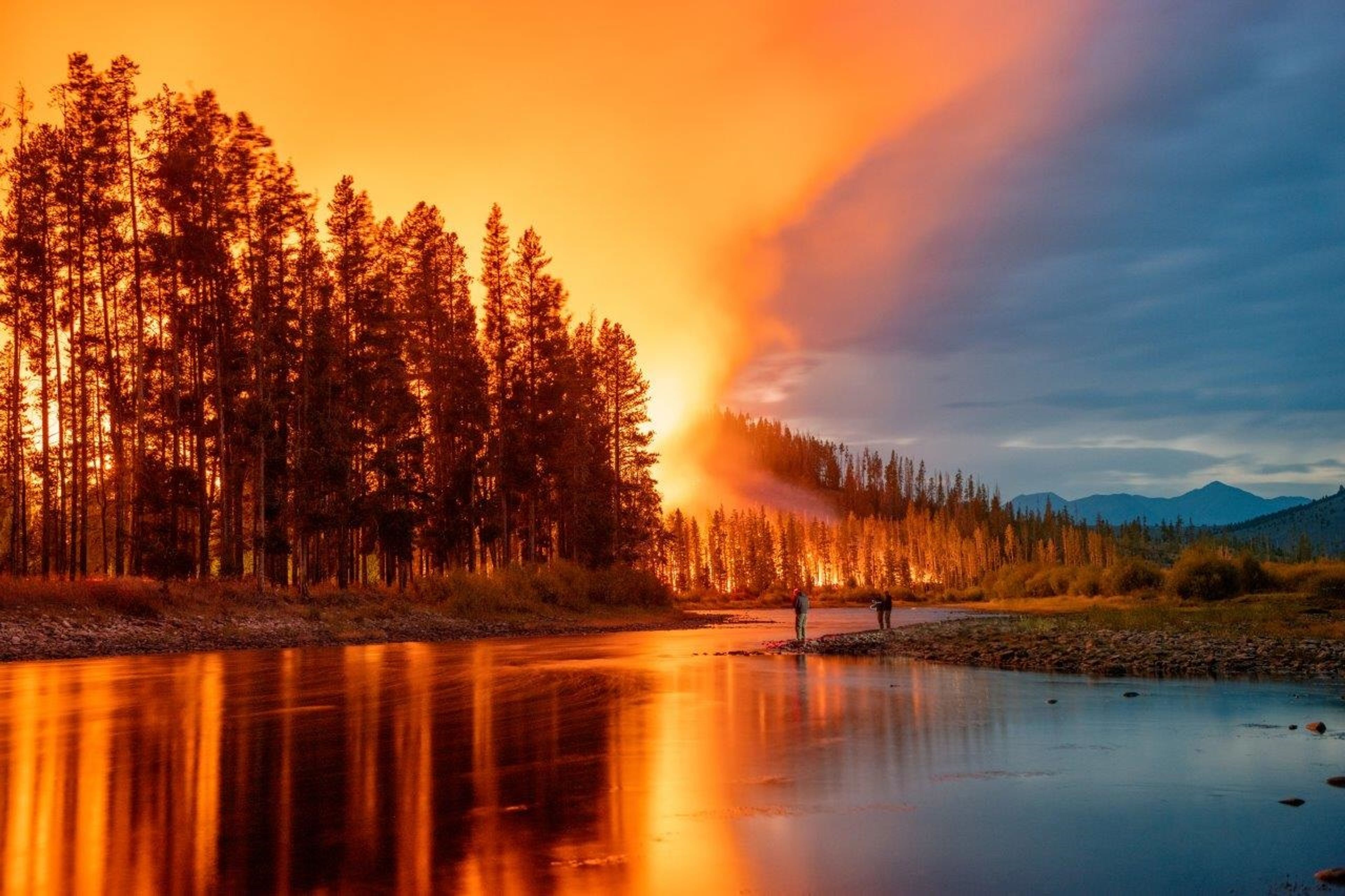 The Alder Creek fire in 2021 burned more than 37,000 acres, much of it in Montana's Beaverhead-Deerlodge National Forest. Kyle Miller shot this photo with a 20 second exposure. In the foreground is the Big Hole River. In the distance at right are the Pintler Mountains.