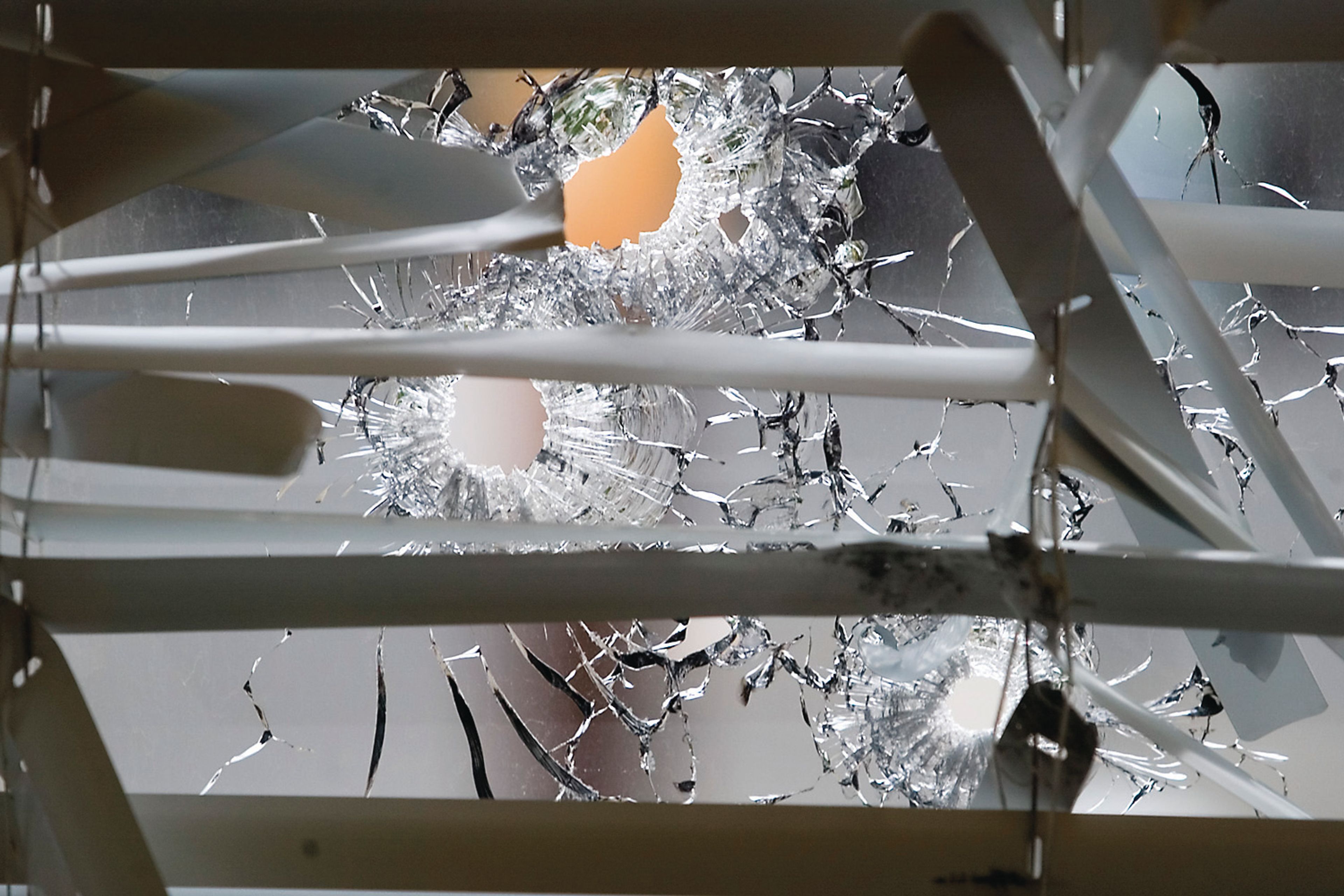 Bullets fired by Jason Hamilton on May 29, 2007, left holes in the windows and mangled mini-blinds at the Latah County Sheriff's Office dispatch center.