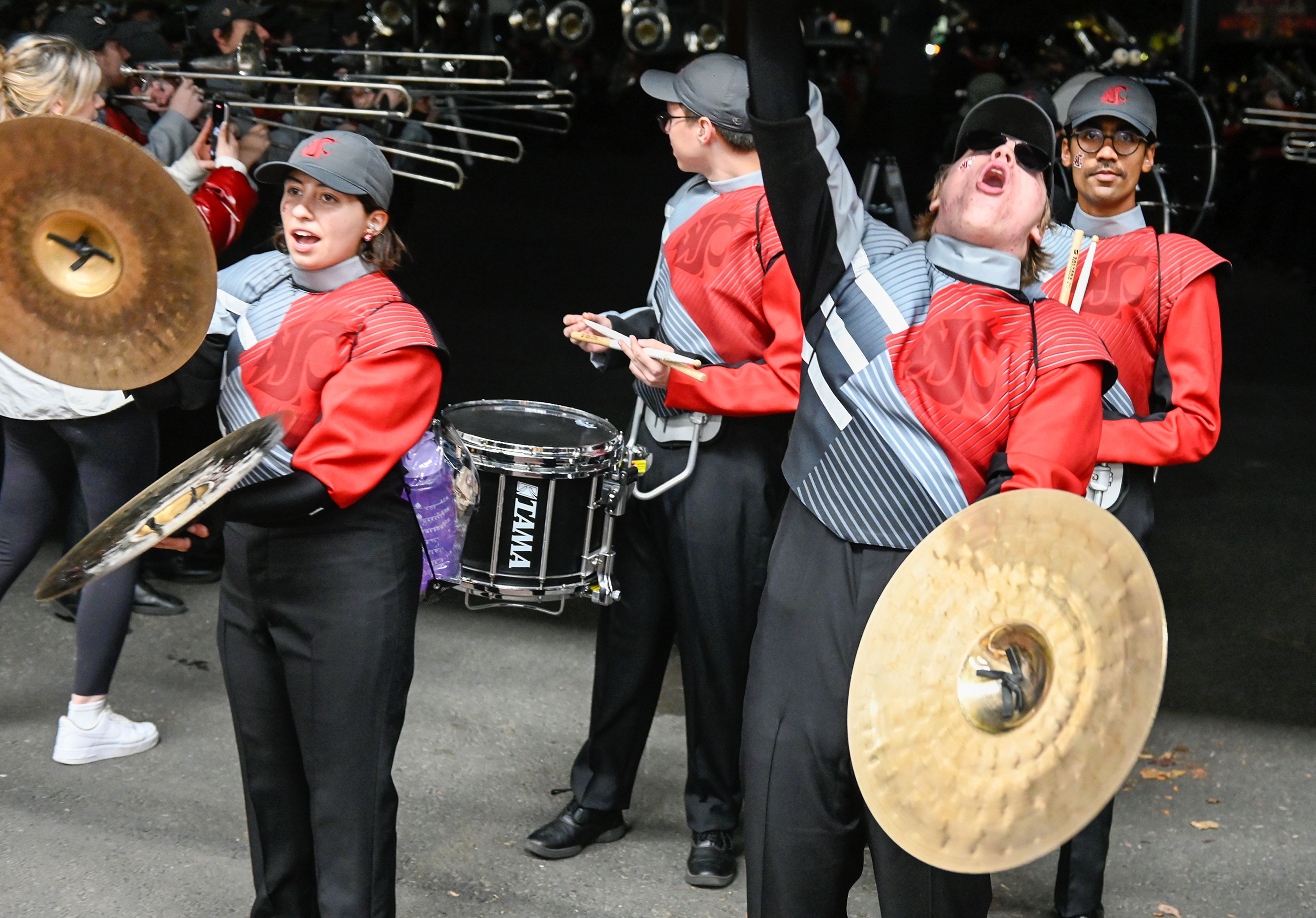 Washington State Cougar Marching Band members prepare for the team’s entrance before a game against Utah State Saturday at Martin Stadium in Pullman.