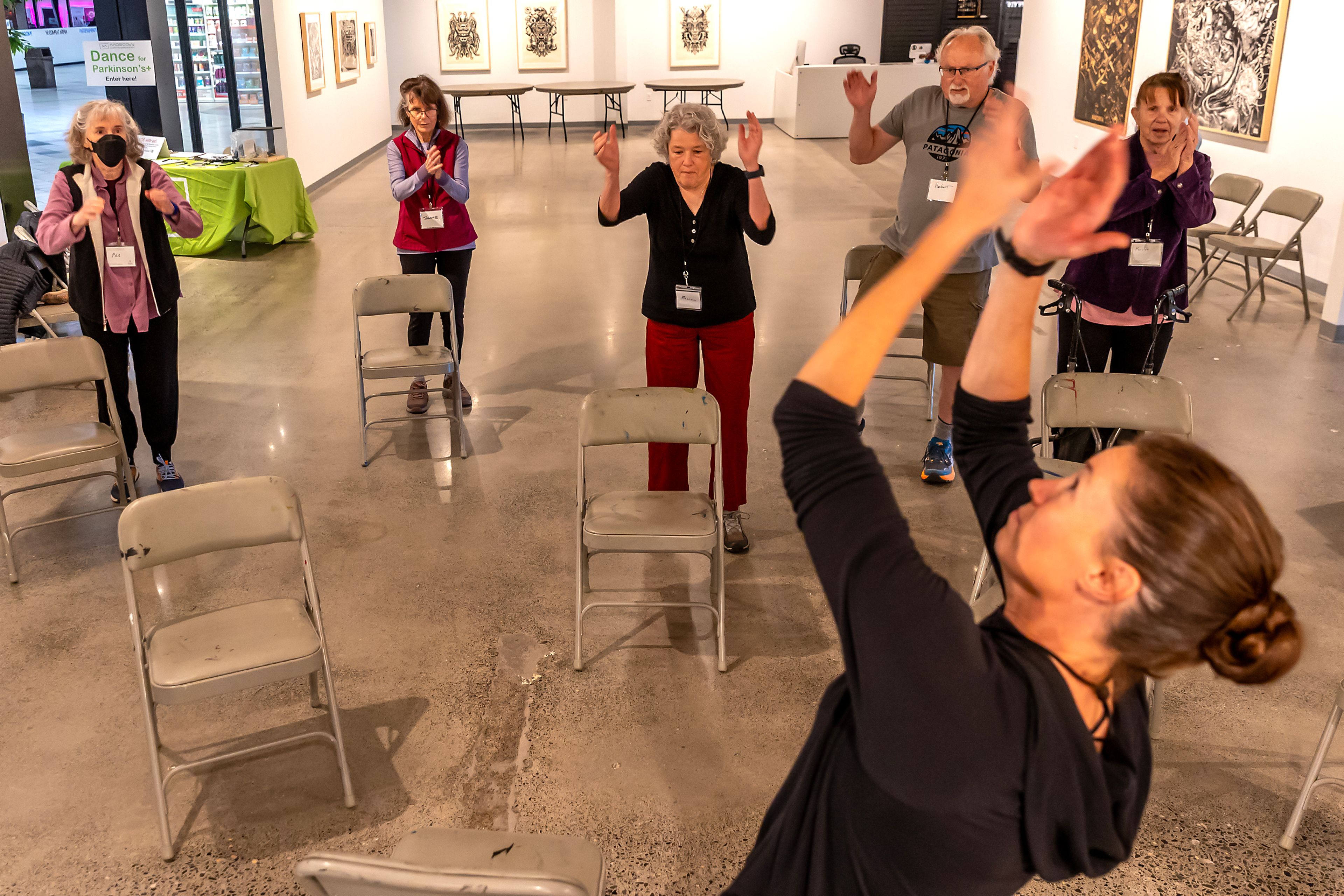 Members of a Dance for Parkinson�s class clap their hands as they dance Tuesday at Moscow Contemporary. ,