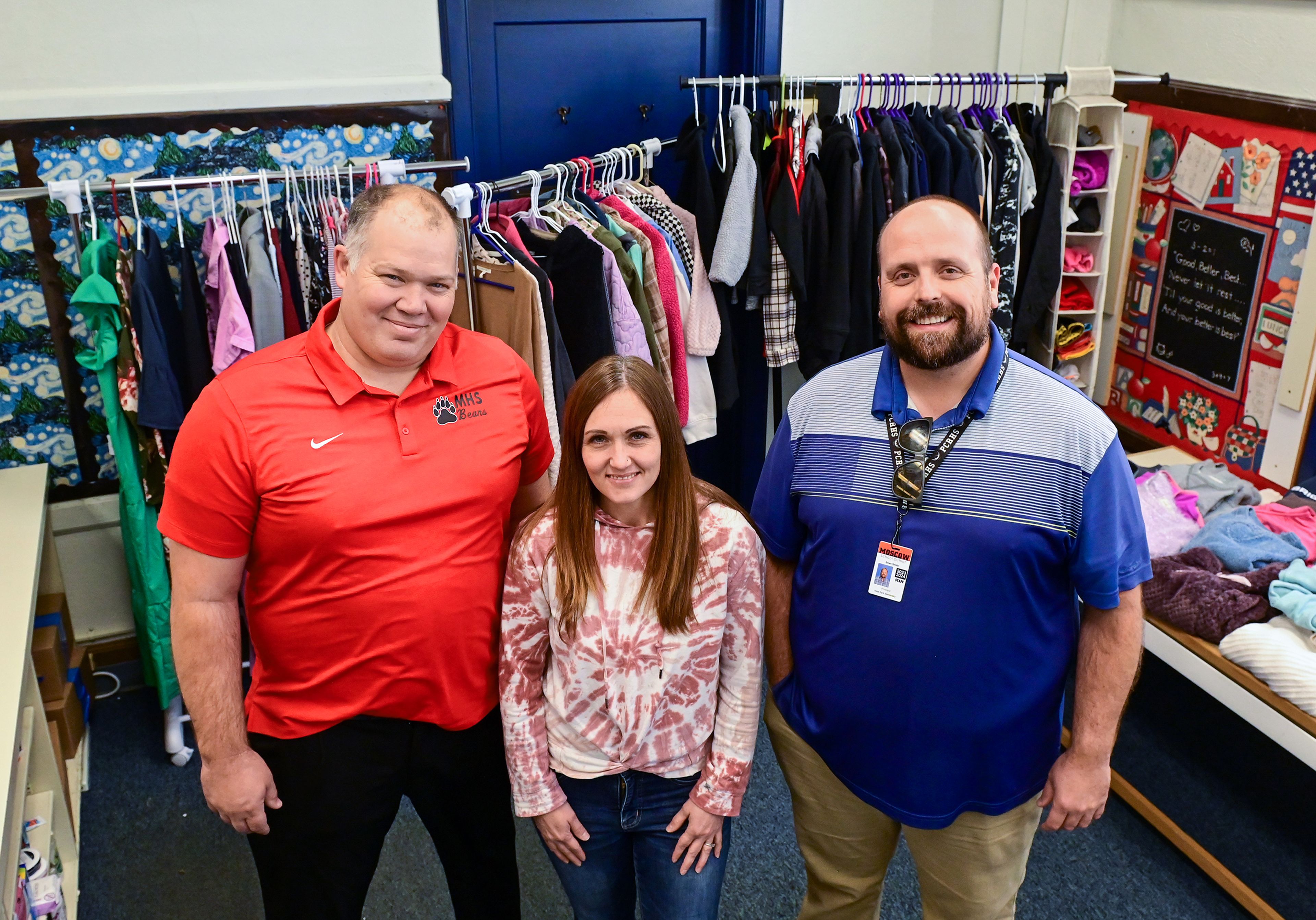 Shawn Tiegs, from left, Moscow School District superintendent, Kelli Sowa, Moscow High School special education teacher, and Brian Smith, community school coordinator and principal at Paradise Creek Regional High School, stand in the MSD Family Resource Hub in the Russell Elementary building Thursday in Moscow.