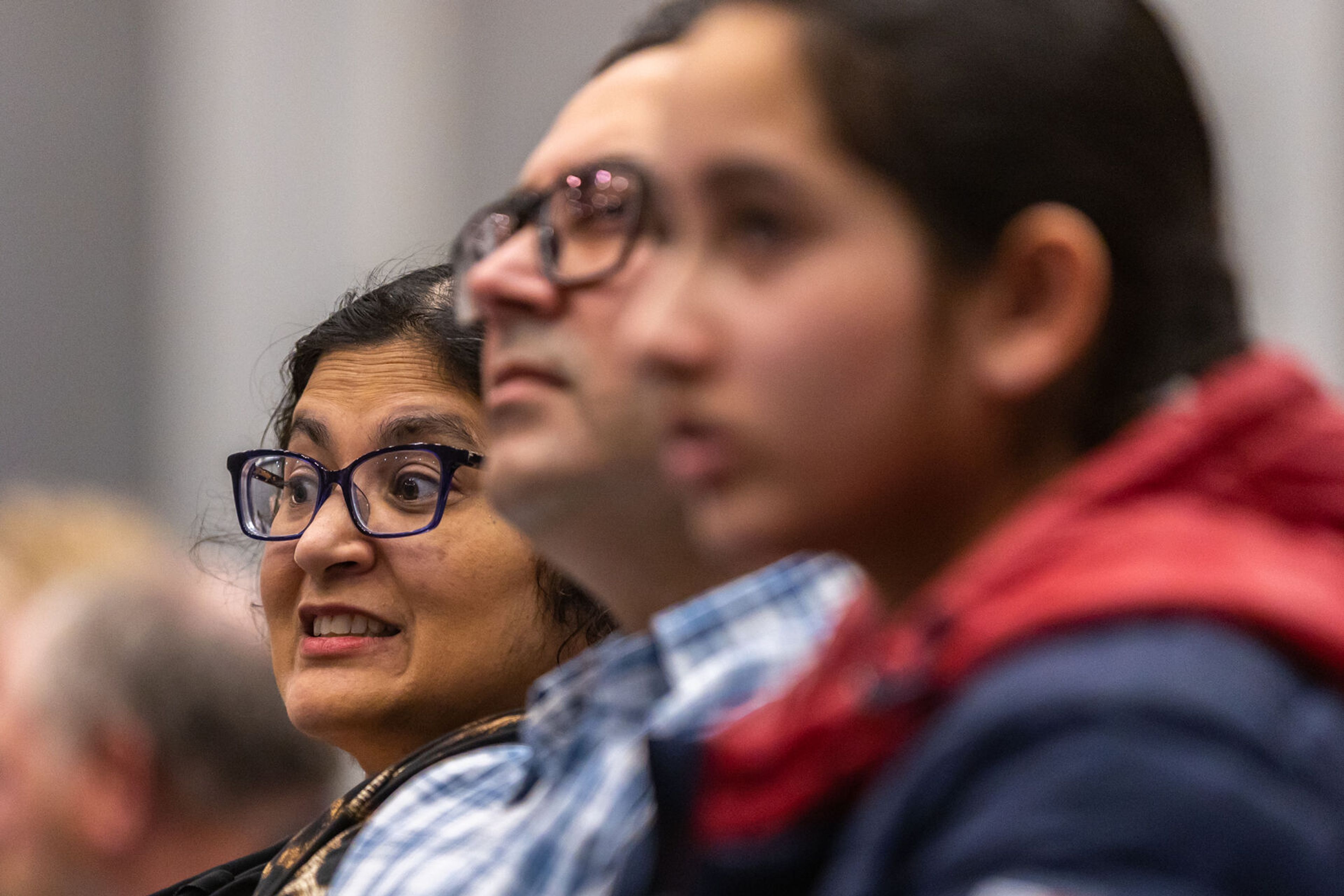 Navdeep Singh, left, looks on anxiously as her son Navtaj misspells a word adding another final round Saturday to the Inland Northwest Regional Spelling Bee at Lewis-Clark State College in Lewiston.