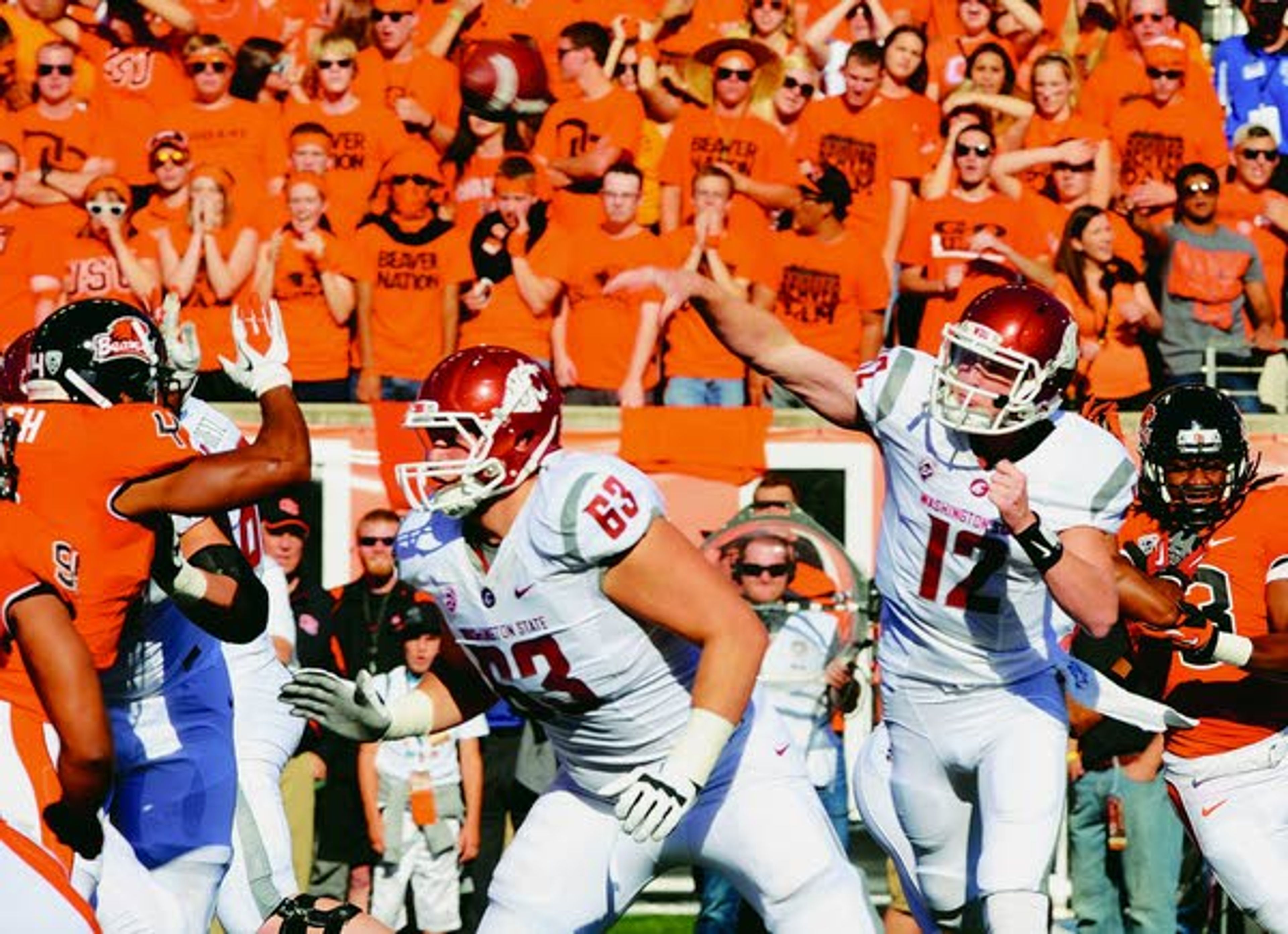 Washington State quarterback Connor Halliday (12) throws against Oregon State at Corvallis, Ore. on Saturday.