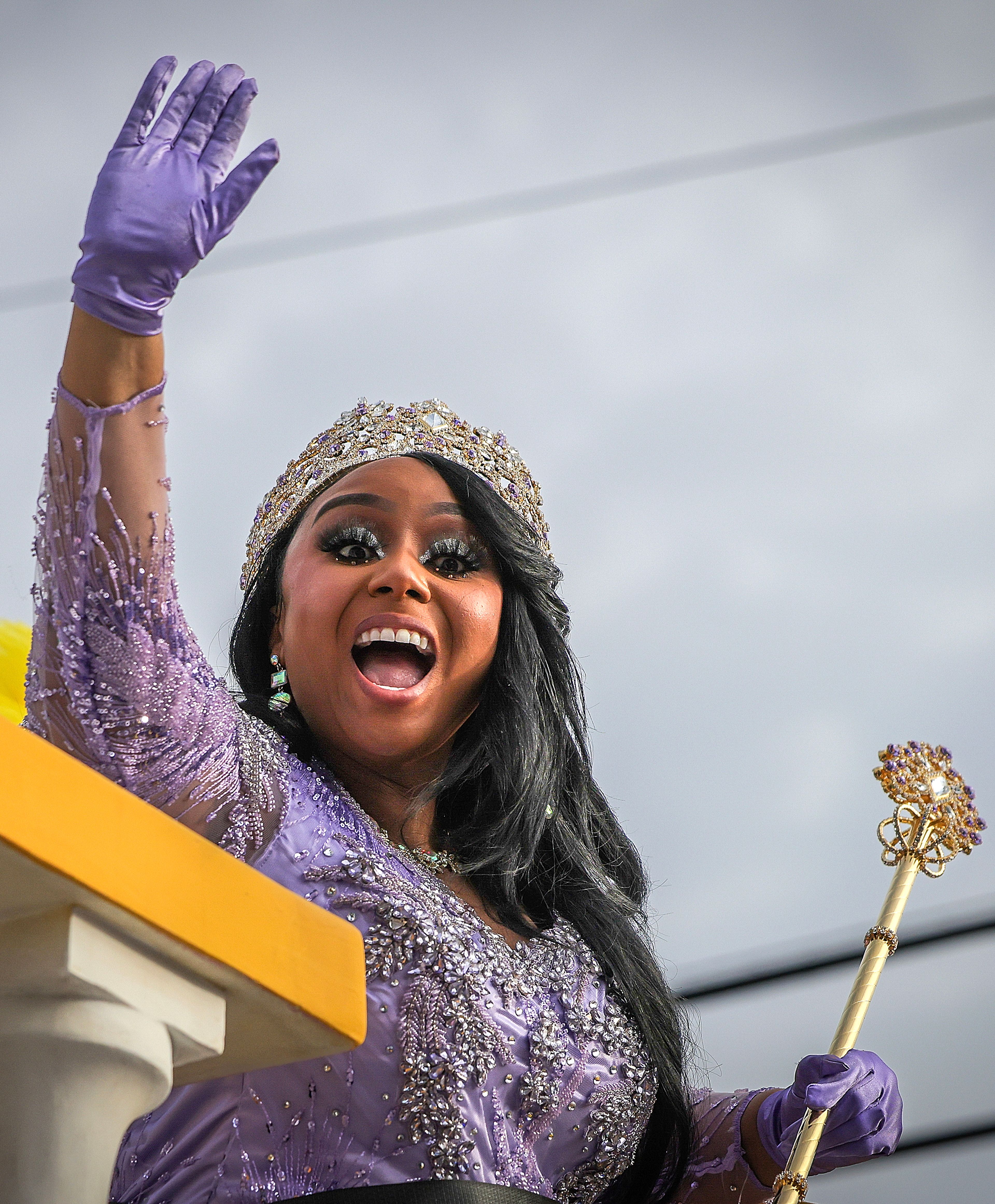 Queen Zulu 2025 Kristen Bonds Mason greets the crowd as the Zulu parade rolls along Jackson Avenue in New Orleans on Mardi Gras Day, Tuesday, March 4, 2025. (Brett Duke/The Advocate via AP)