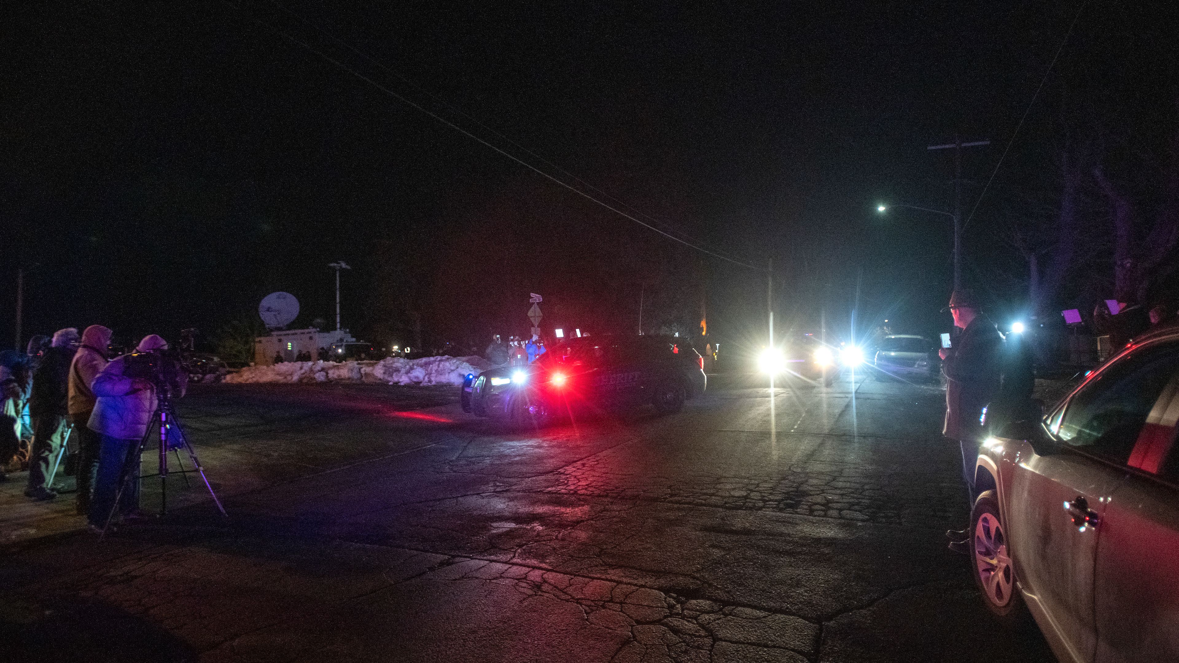 A convoy of law enforcement arrive at the Latah County Sheriff’s Office in Moscow with suspect Bryan Kohberger on Wednesday evening.