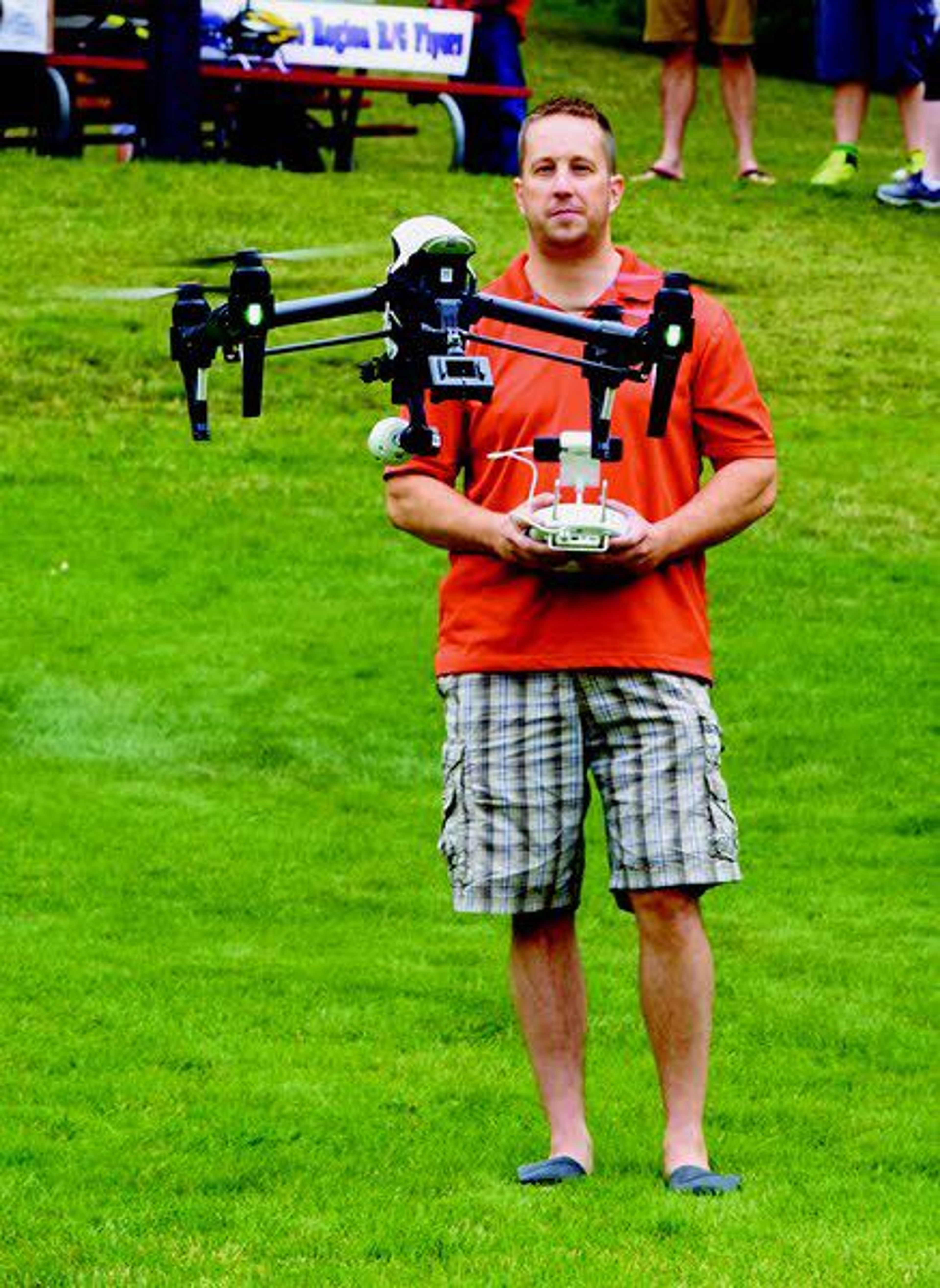 Matt Burkett, one of Pullman Police Department’s three drone pilots, operates the department’s Inspire I drone Saturday morning during a demonstration at Kruegel Park.