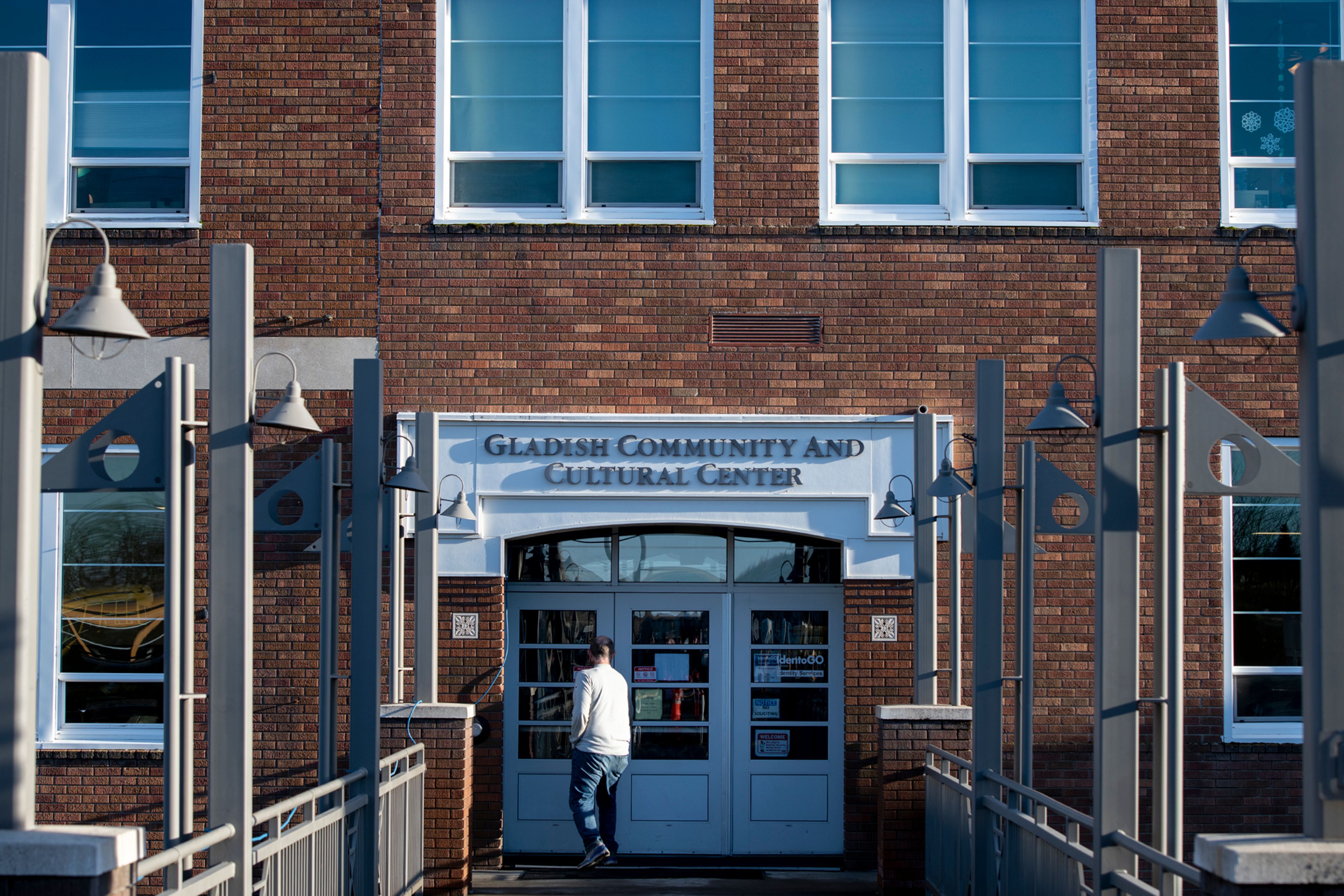 A visitor enters the main entrance of the Gladish Community and Cultural Center in Pullman on Friday.