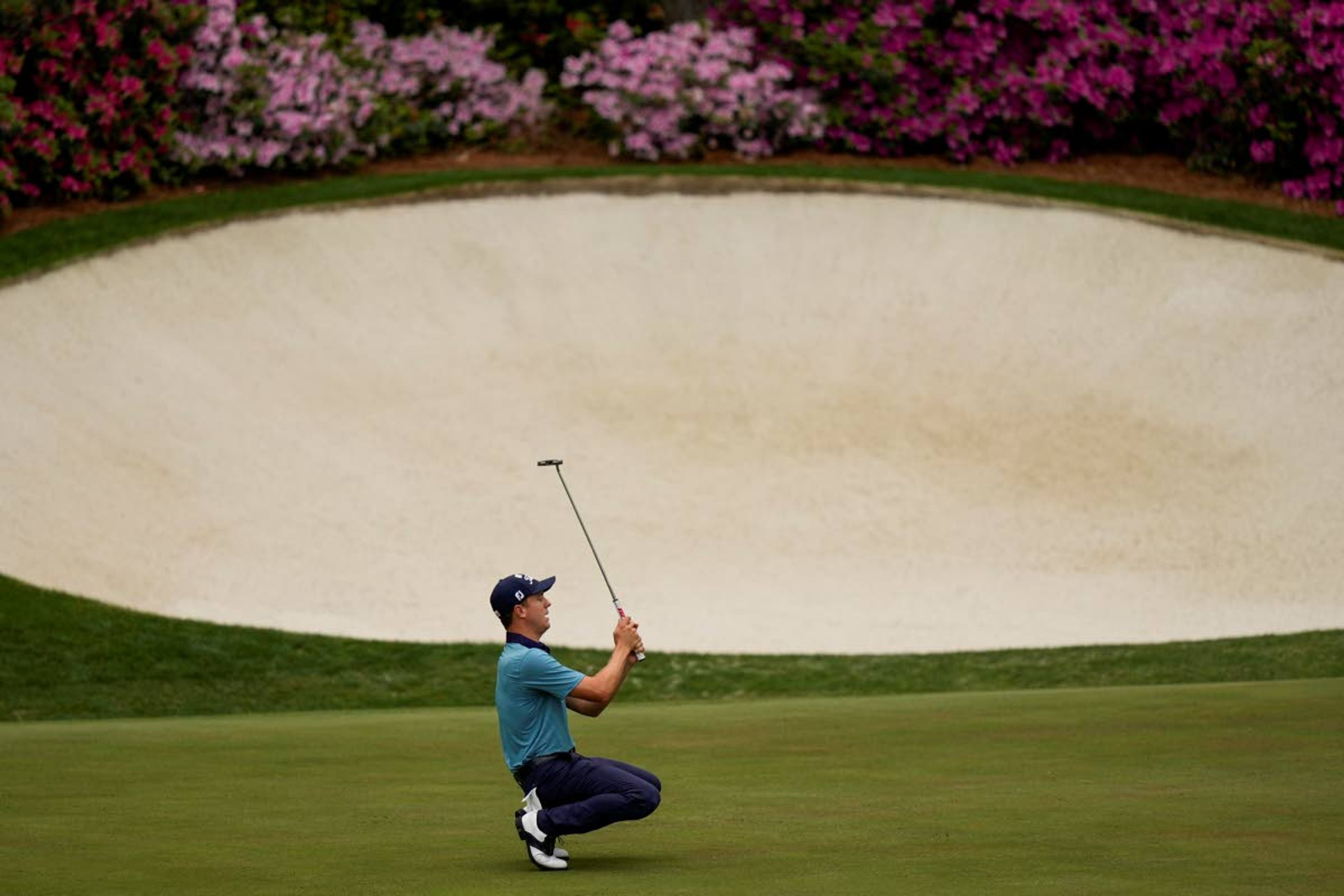 Justin Thomas reacts after missing an eagle putt on the 13th green during the second round of the Masters golf tournament on Friday, April 9, 2021, in Augusta, Ga. (AP Photo/David J. Phillip)