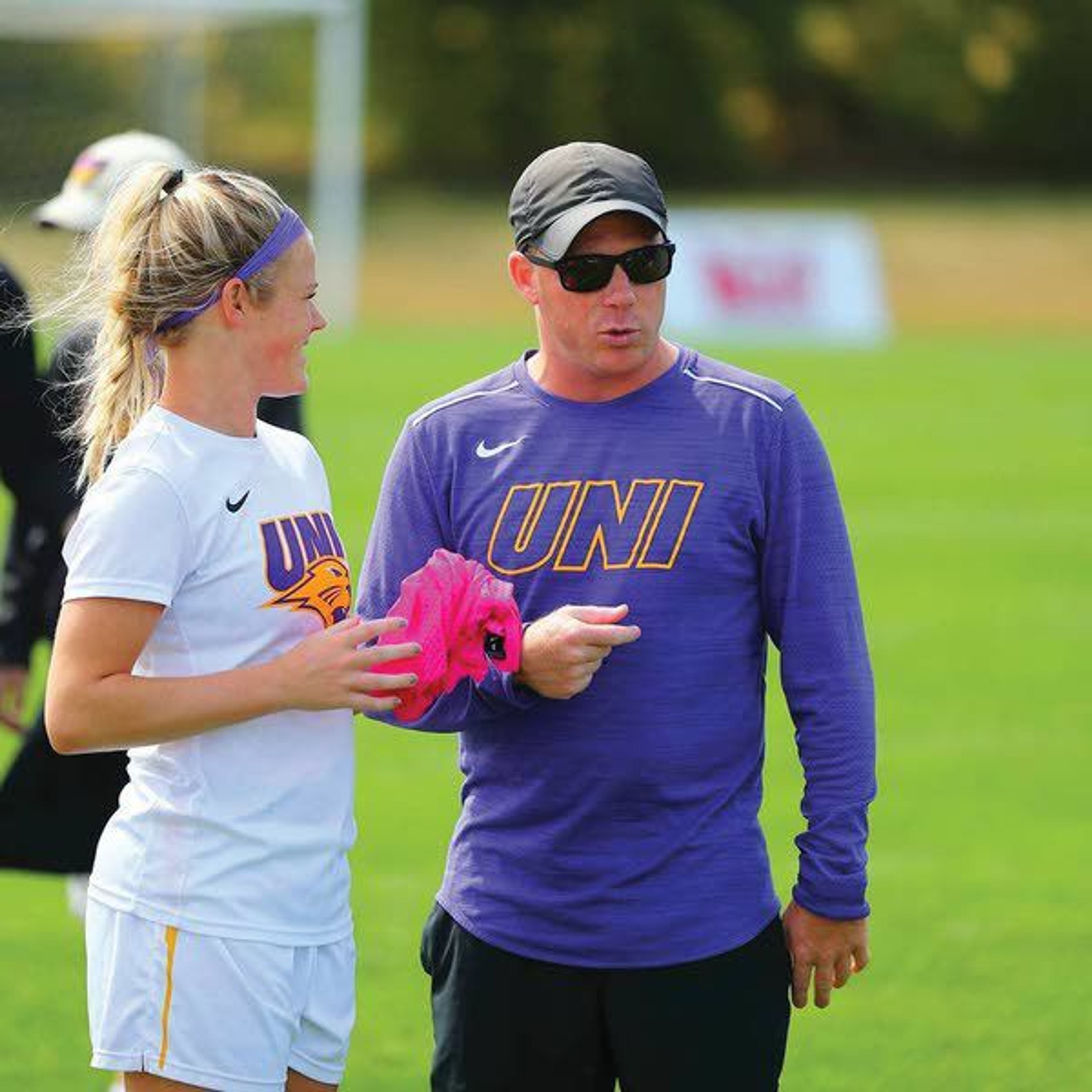 Northern Iowa women’s soccer coach Jeremy Clevenger consults with one of his players. Clevenger is taking over the Idaho program, the school announced Wednesday.