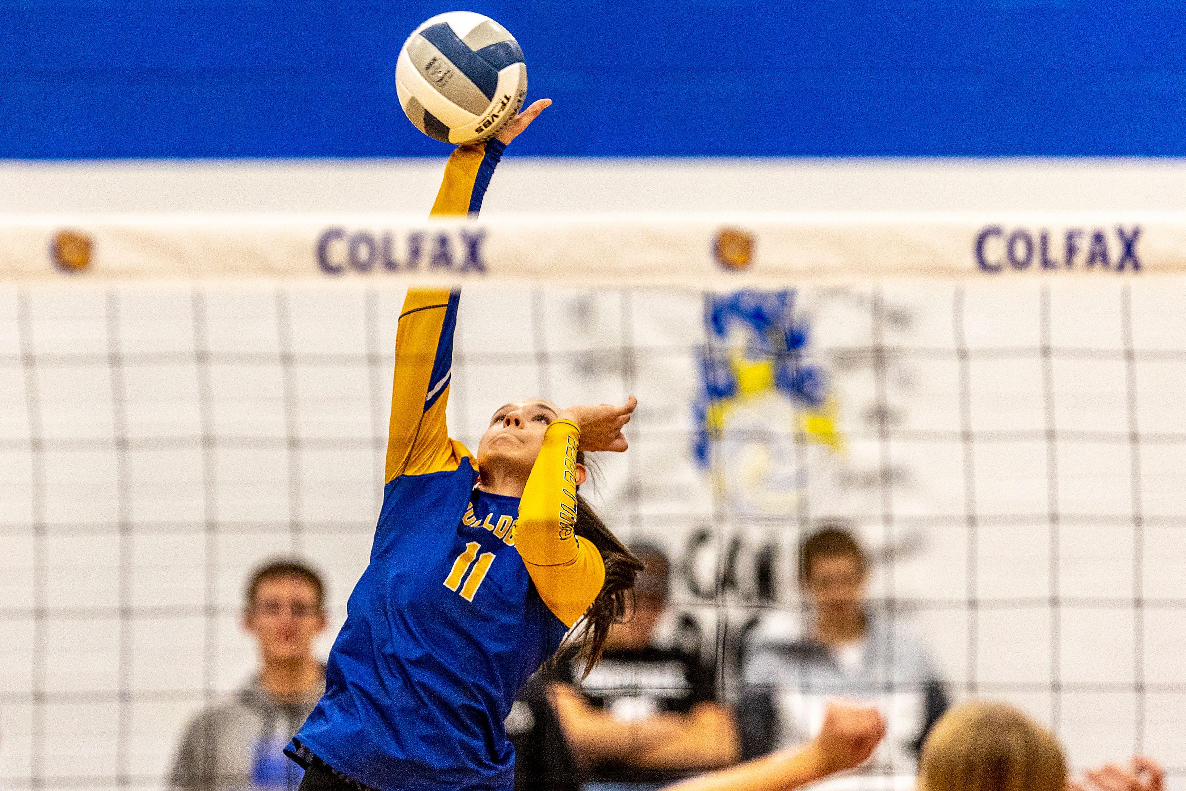 Colfax middle blocker Hailey Demler spikes the ball against St. George's at Colfax on Tuesday.