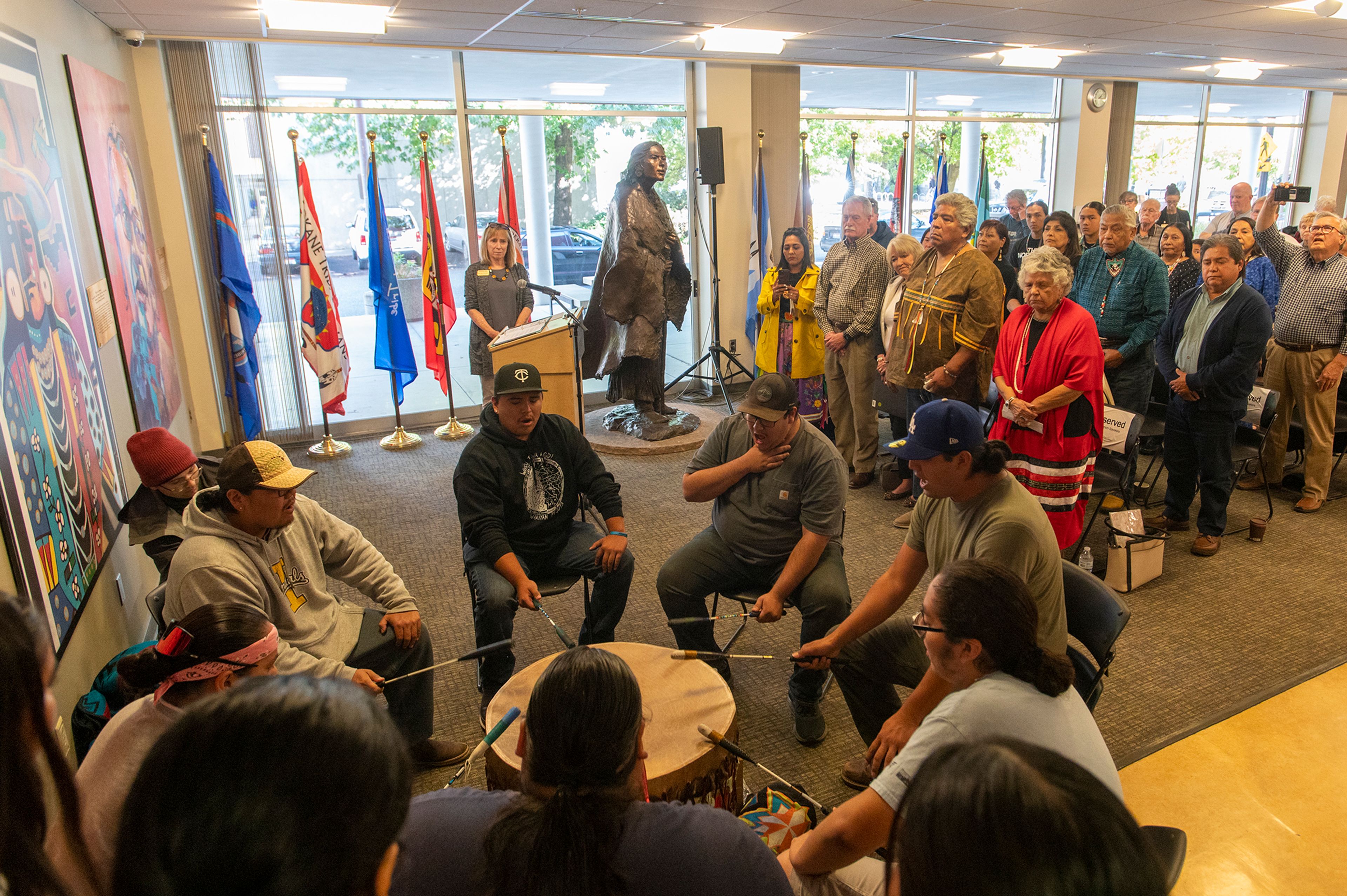 The Vandal Nation Drum group performs during a dedication for the sculpture, “Sacagawea and Jean Baptiste,” at the University of Idaho inside Bruce M. Pitman Center’s Tribal Lounge in Moscow on Friday.