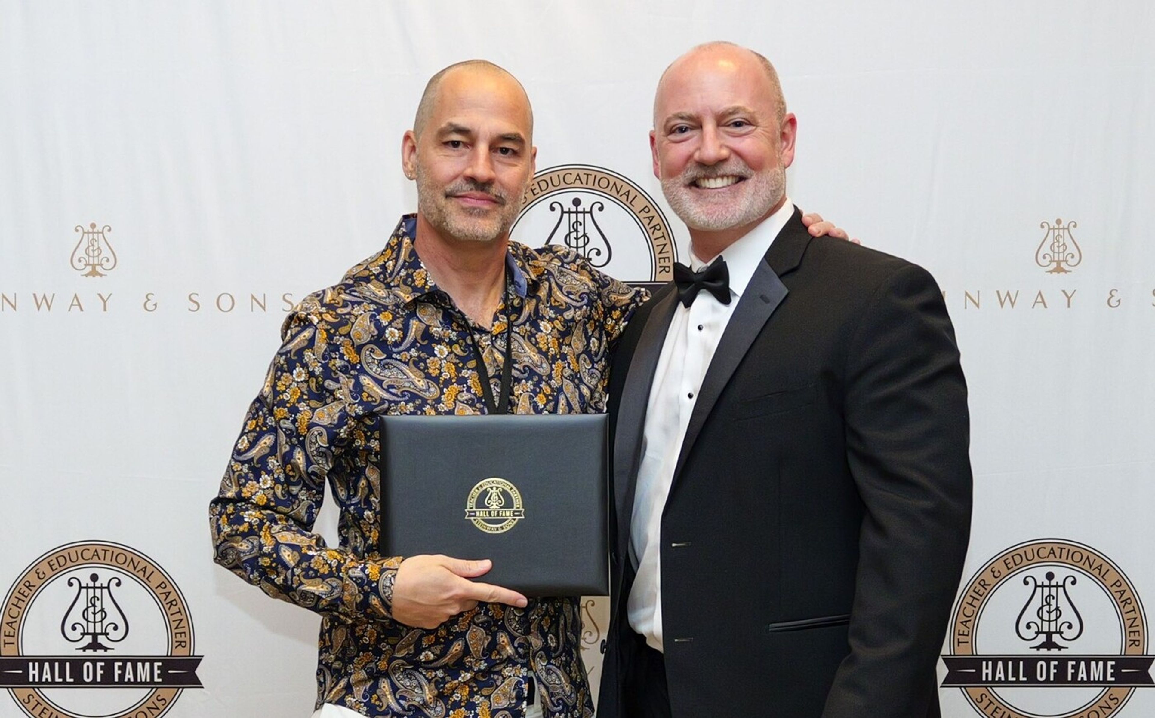 Roger McVey, left, an assistant professor of piano at the University of Idaho, was last month inducted into the Steinway & Sons Music Teacher Hall of Fame. McVey is shown with Steinway & Sons President Gavin English at the induction ceremony at the Steinway factory in Astoria, New York. According to a news release from the company, which submitted the image, McVey was among 67 teachers from the United States and Canada inducted into the hall of fame. Teachers were selected "for their outstanding instruction and leadership in acoustic piano education and their commitment to teaching in their community for over a decade." Each teacher inducted, according to the release, is part of the Steinway Teacher & Educational Partner Program and was nominated by a Steinway & Sons showroom in the teacher’s home region. The teachers’ names are now displayed on a commemorative display wall inside the Steinway factory. McVey was nominated Steinway Piano Gallery of Spokane, a longtime sponsor and provider of pianos for the UI Lionel Hampton Jazz Festival. McVey lives in Moscow, Idaho, with his wife, Giselle, and their three children.