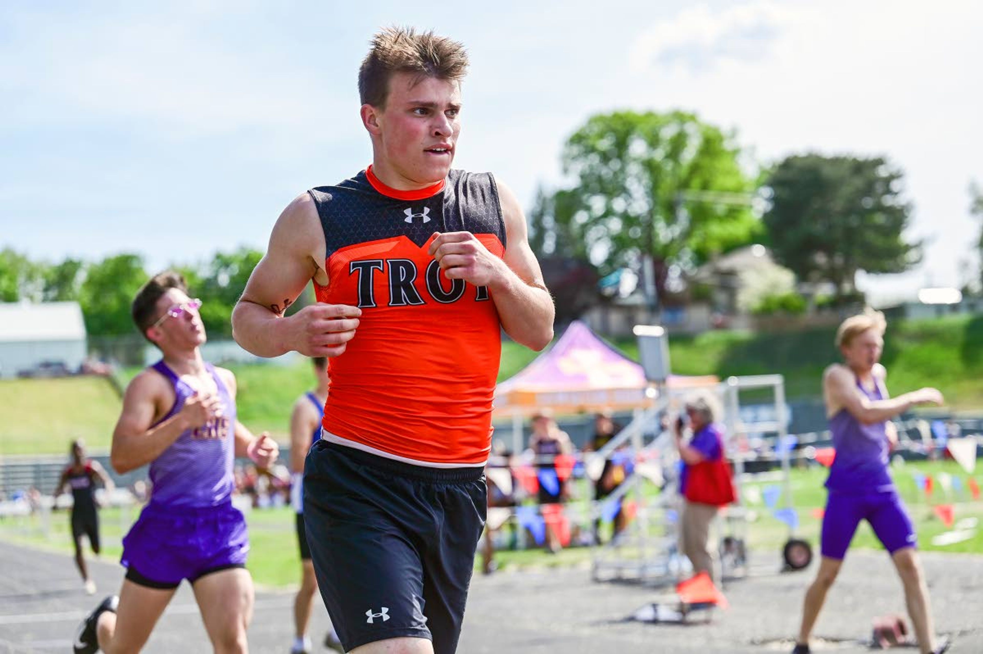 Troy’s Elijah Phillis slows down after finishing first in the 400-meter dash winning with a time of 53.29 seconds Thursday afternoon at the District II Meet of Champions at Vollmer Bowl in Lewiston.