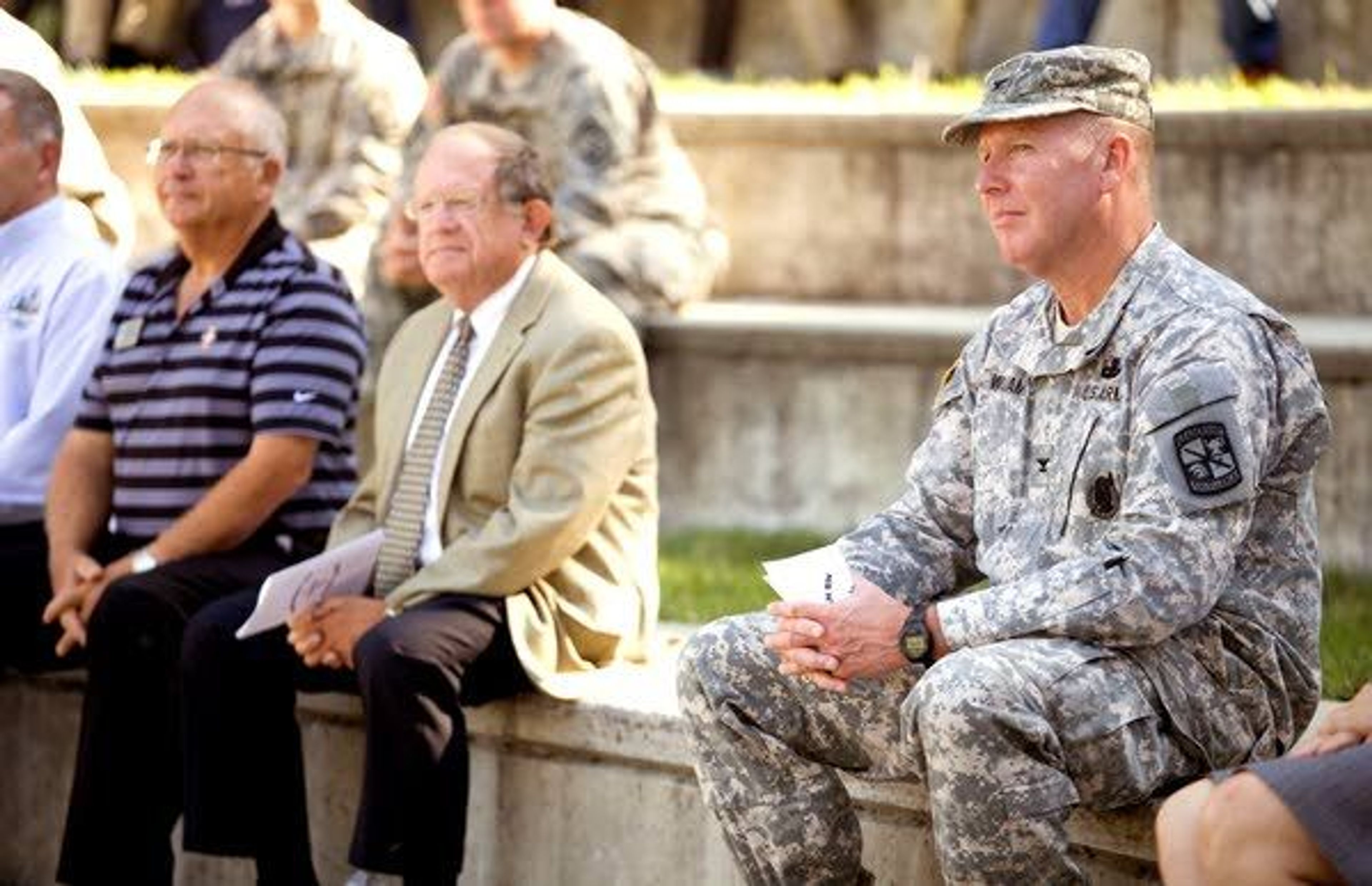 Col. Samuel Williams, right, watches the ROTC ceremony. As commander of Cadet Command’s 8th Brigade, Williams is responsible for many states’ Army ROTC programs.