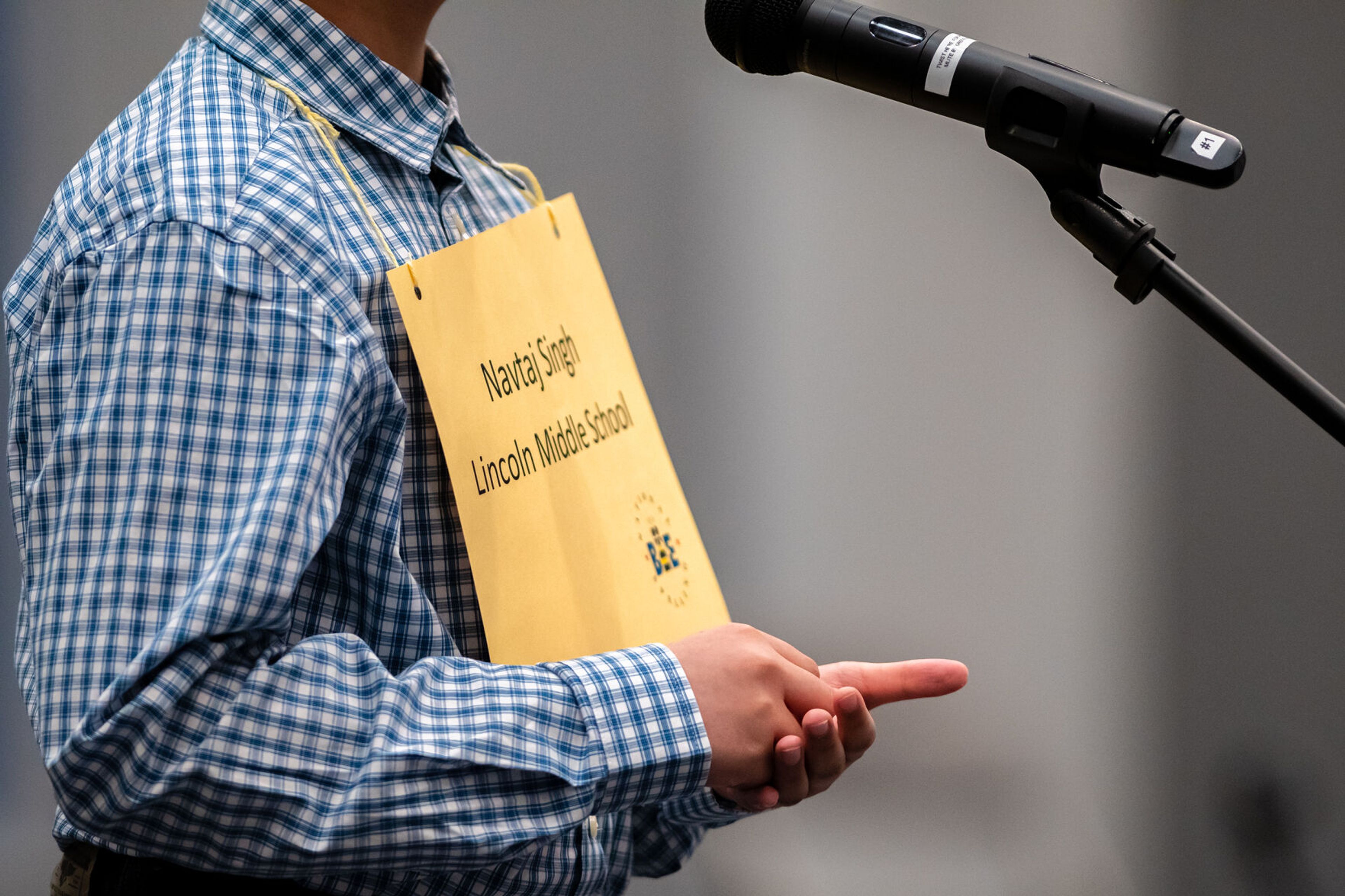 Navtaj Singh, of Lincoln Middle School, concentrates on the spelling of his next word Saturday during the Inland Northwest Regional Spelling Bee at Lewis-Clark State College in Lewiston.