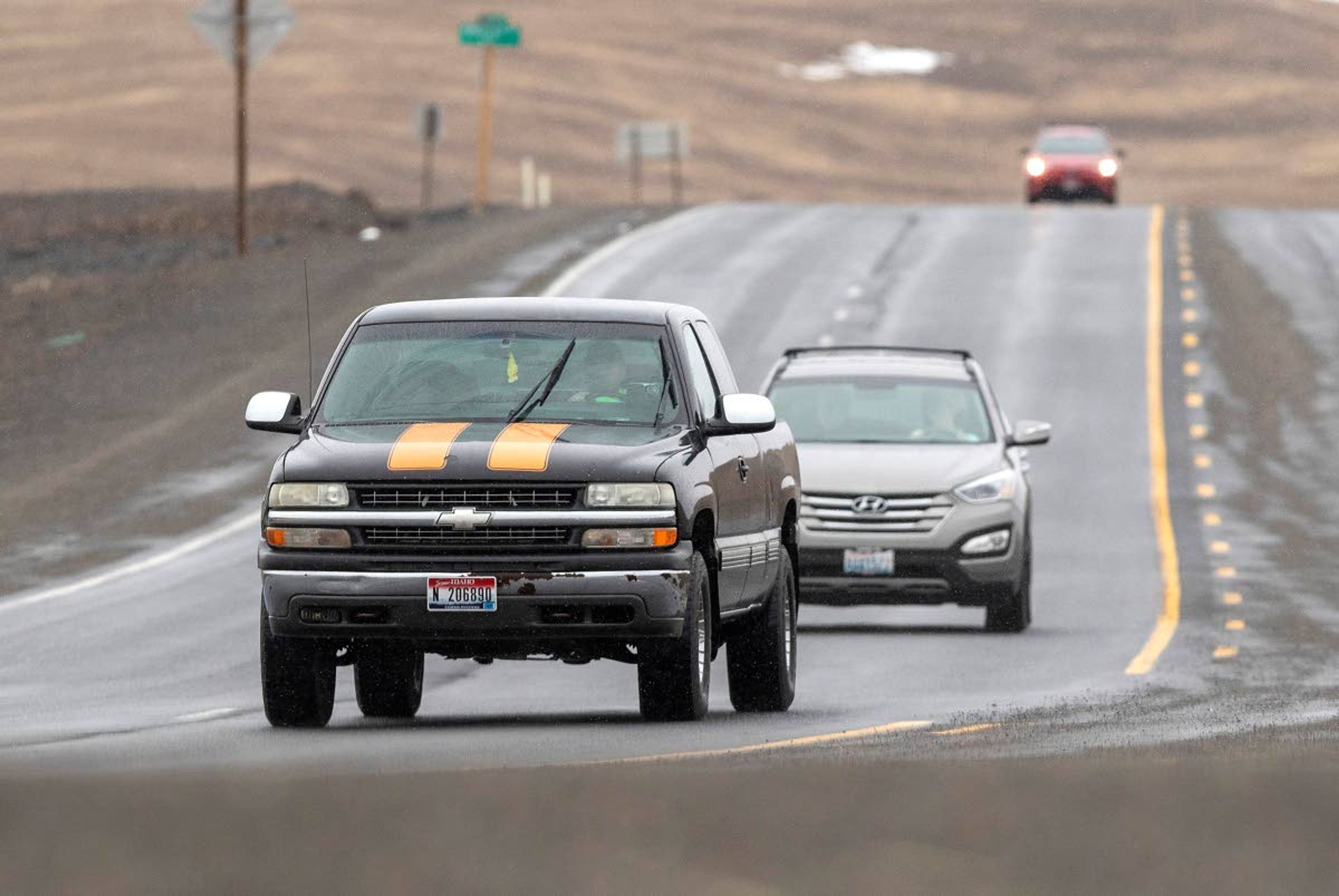 Cars drive on Highway 270 on Wednesday between Pullman and Moscow. The Pullman Police Department is reminding motorists to drive in the right lane except when passing another vehicle.