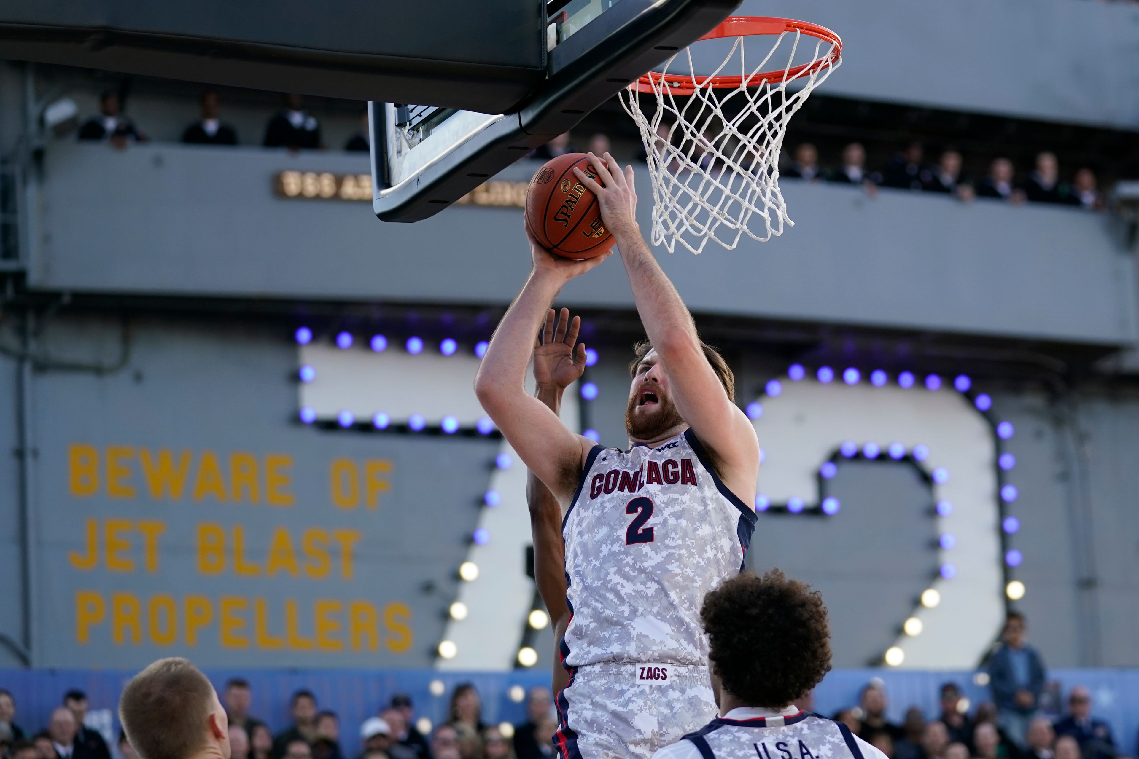 Gonzaga forward Drew Timme (2) catches a rebound during the first half of the Carrier Classic NCAA college basketball game against the Michigan State aboard the USS Abraham Lincoln in Coronado, Calif. Friday, Nov. 11, 2022. (AP Photo/Ashley Landis)