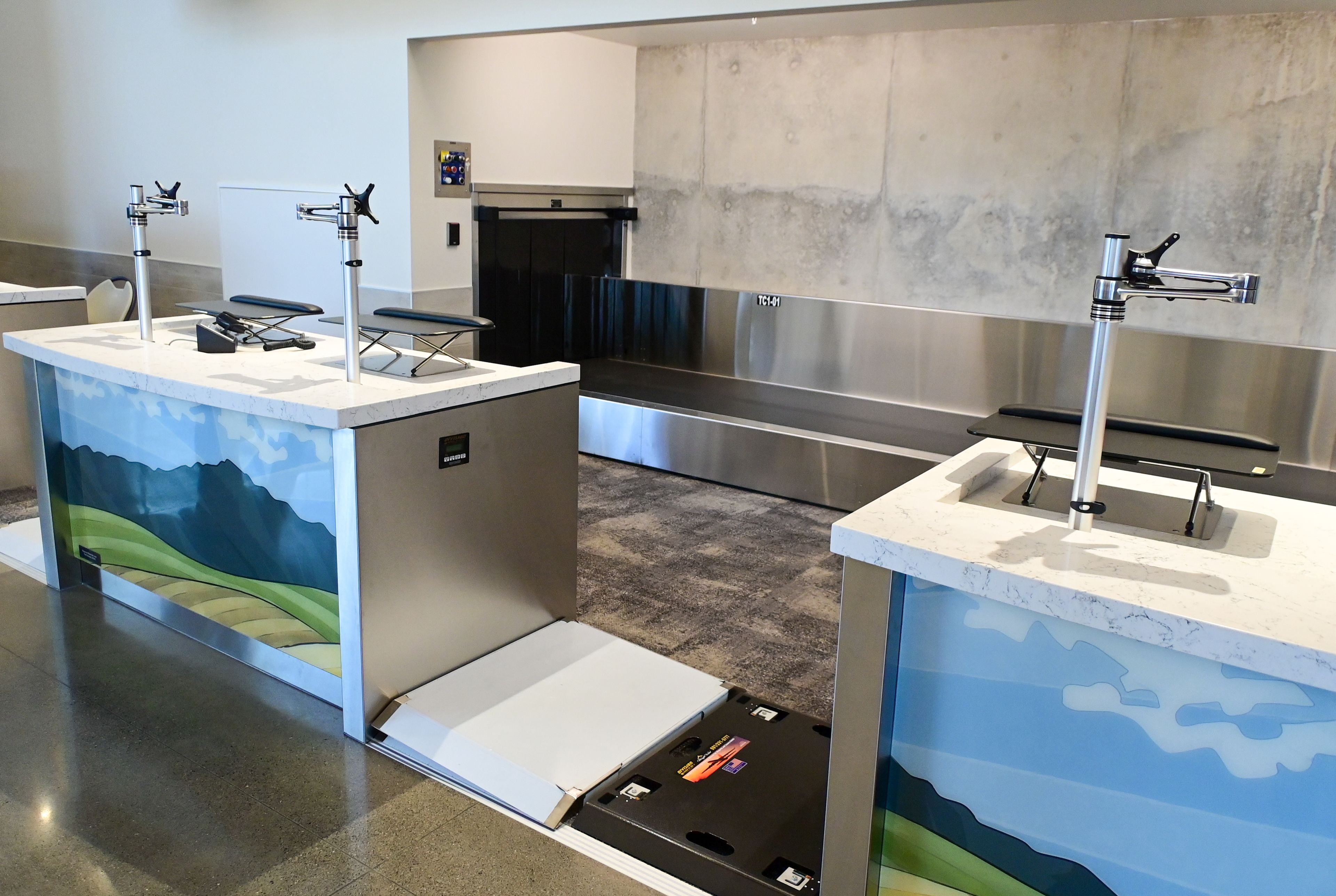 New desks and baggage scales for ticketing sit to the right of the entrance of the new terminal at the Pullman-Moscow Regional Airport at Schweitzer Field in Pullman on Tuesday.