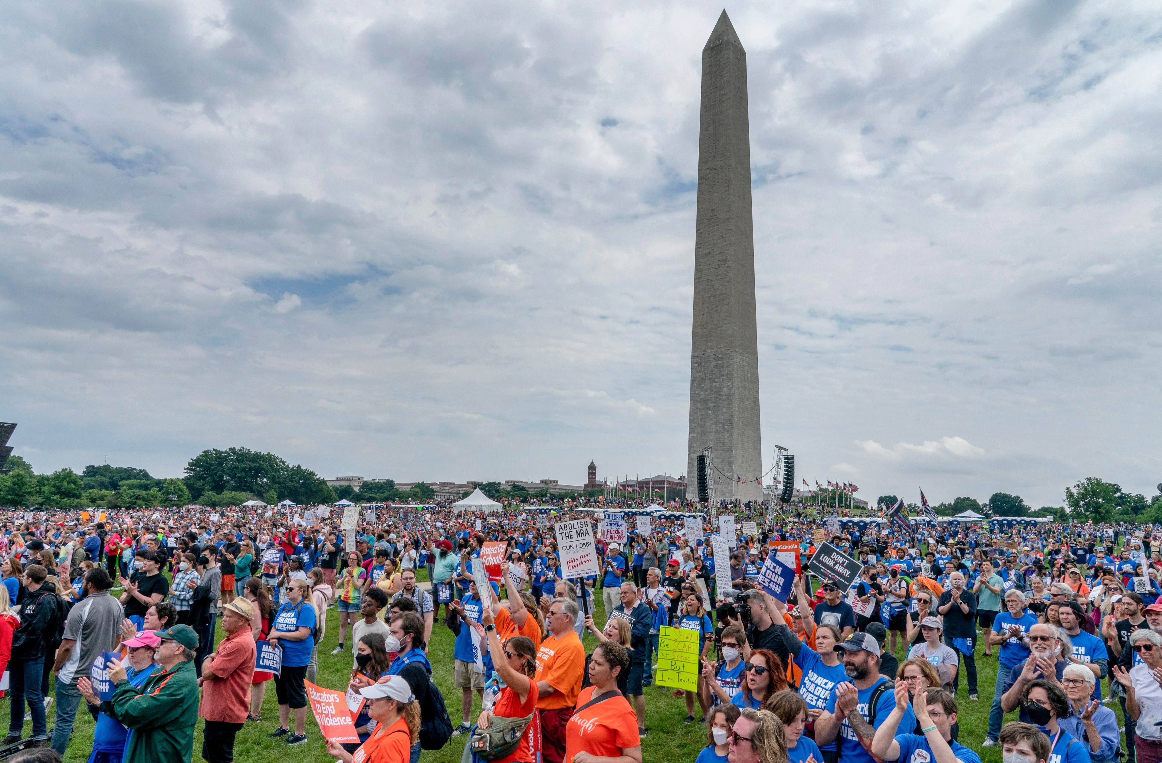 People participate in the second March for Our Lives rally in support of gun control in front of the Washington Monument, Saturday, June 11, 2022, in Washington. The rally is a successor to the 2018 march organized by student protestors after the mass shooting at a high school in Parkland, Fla. (AP Photo/Gemunu Amarasinghe)