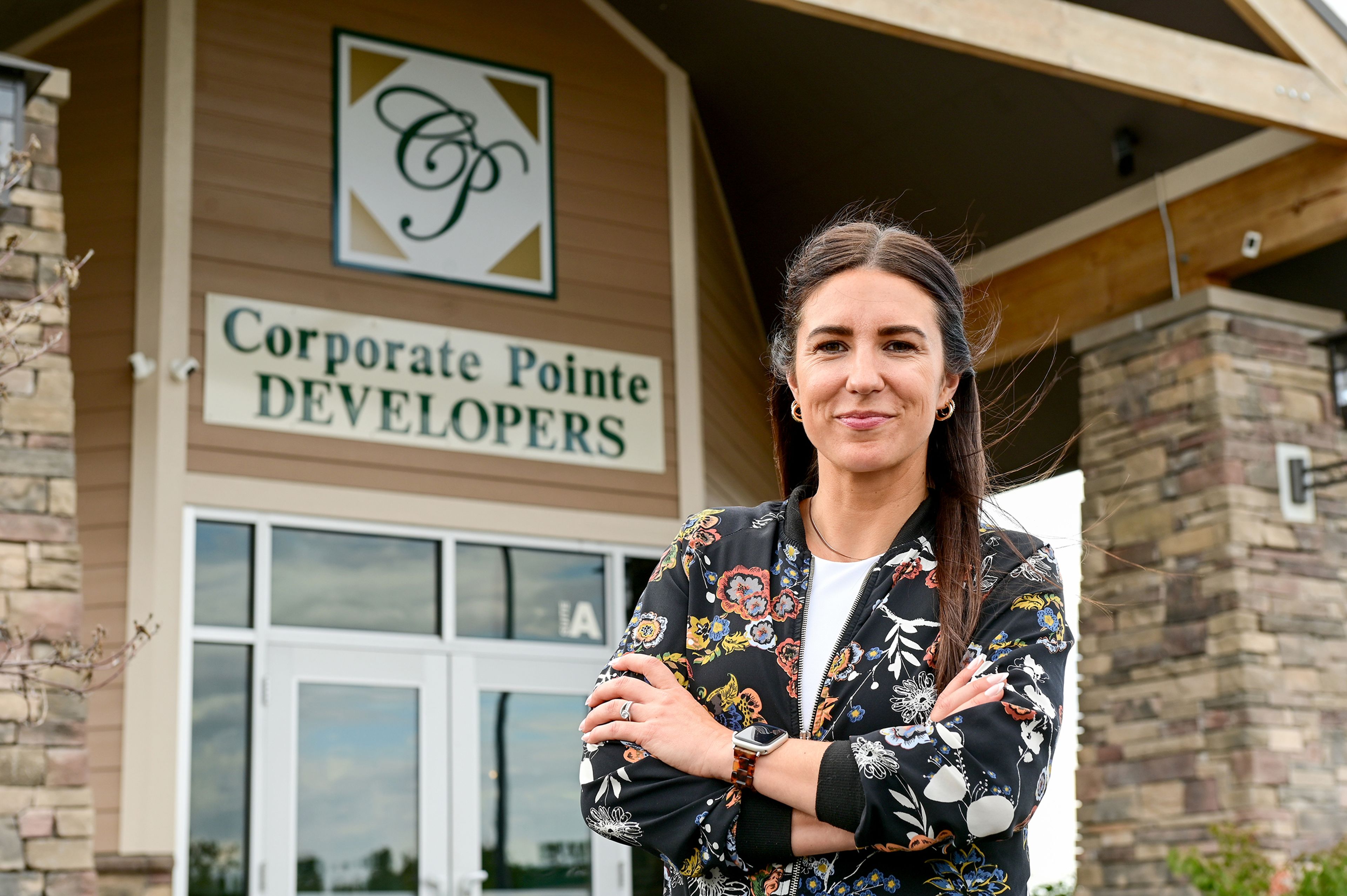 Nicole Morscheck stands outside of Corporate Pointe Developers in Pullman. Morscheck serves as the company's general manager, and is working to move into the role of president and managing member.