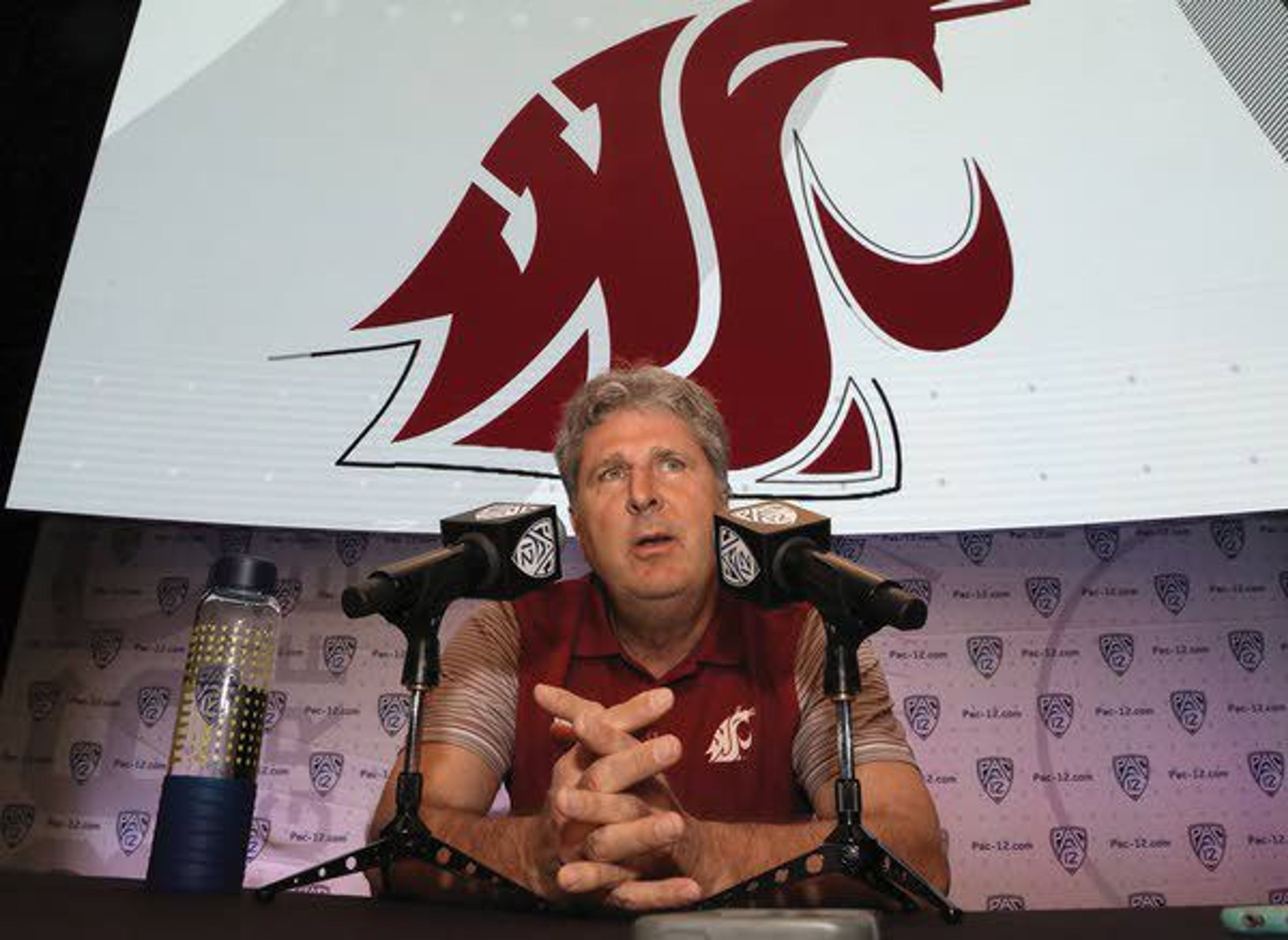 Washington State coach Mike Leach speaks at the Pac-12 college football media day Thursday in Los Angeles.