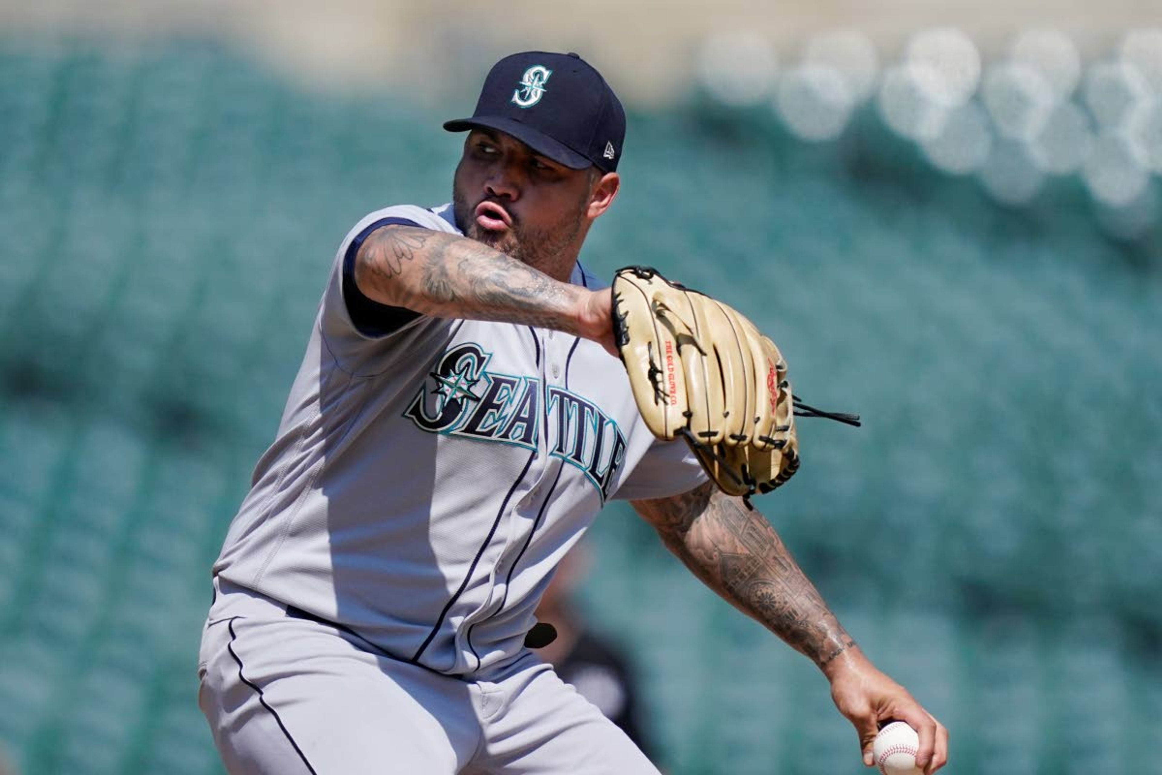 Seattle Mariners relief pitcher Hector Santiago throws during the eighth inning of a baseball game against the Detroit Tigers, Thursday, June 10, 2021, in Detroit. (AP Photo/Carlos Osorio)